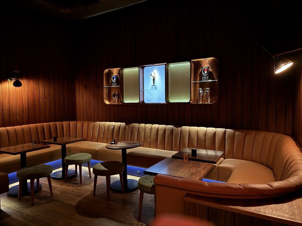 Interior of Double Chicken Please bar in New York City – inventive cocktail lounge with modern and quirky design