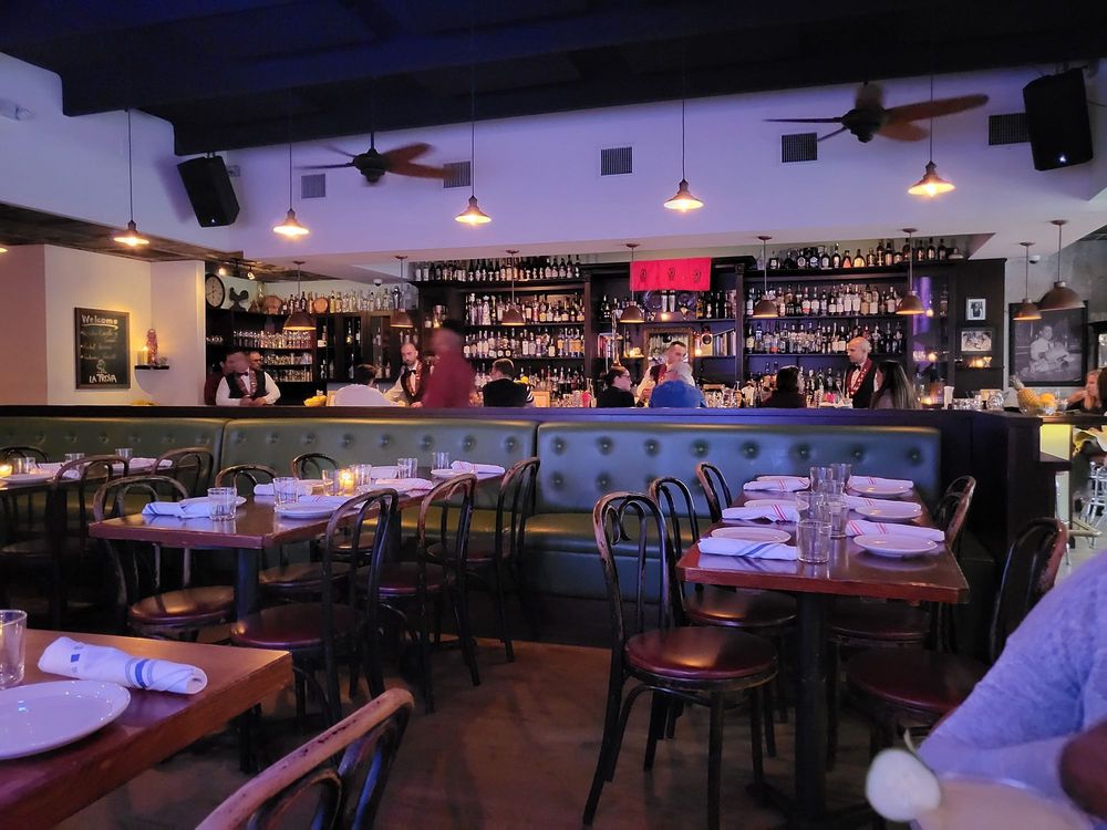 Interior of Cafe La Trova bar in Miami – Cuban-inspired cocktail bar with vintage 1950s Havana decor and lively atmosphere
