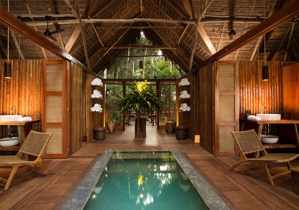 Luxury Amazon rainforest villa at Inkaterra Lodge with private plunge pool, open-air design, and natural wood interiors