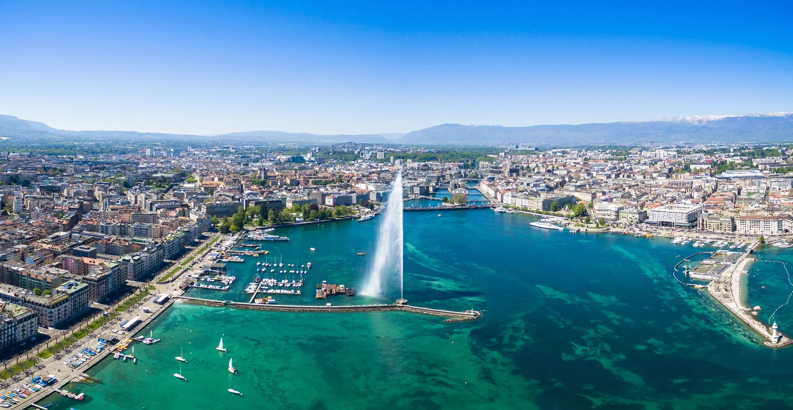 Picture of Jet d'Eau fountain and harbor in Geneva. Geneva, Switzerland.