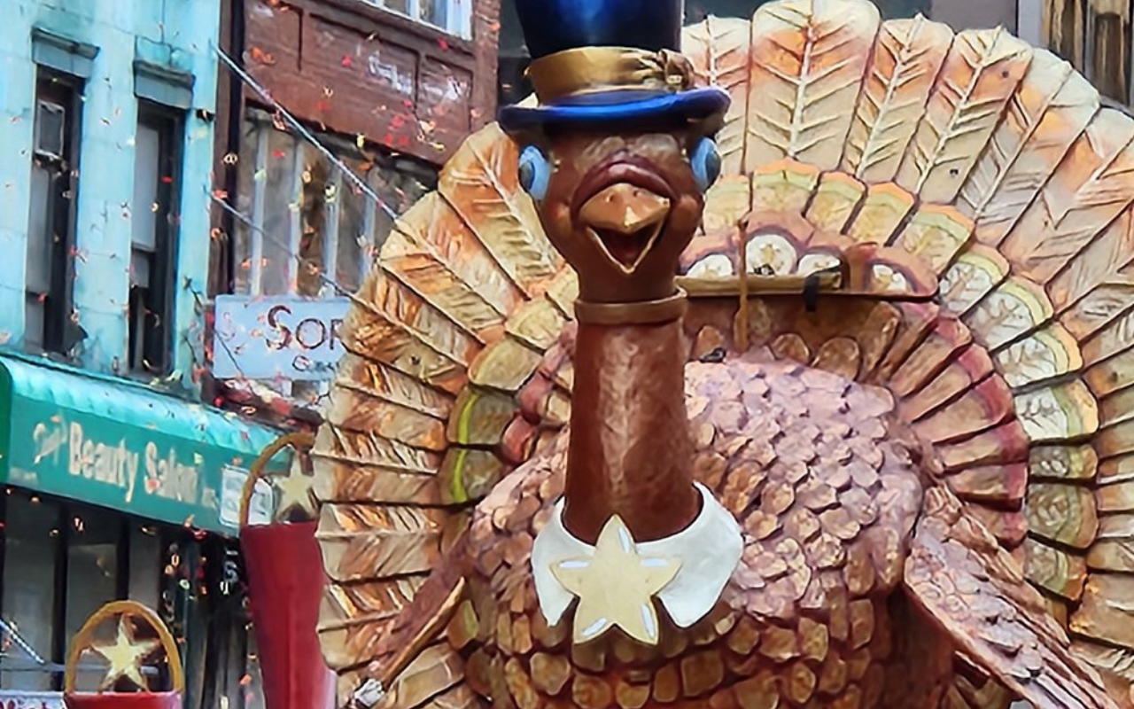 Giant turkey float at Macy’s Thanksgiving Day Parade in New York City, a classic family holiday getaway.