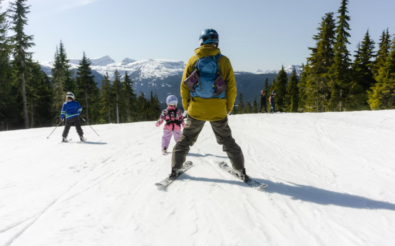 Family skiing at Copper Ski Resort in Colorado, a snowy Thanksgiving vacation spot with slopes and mountain views.