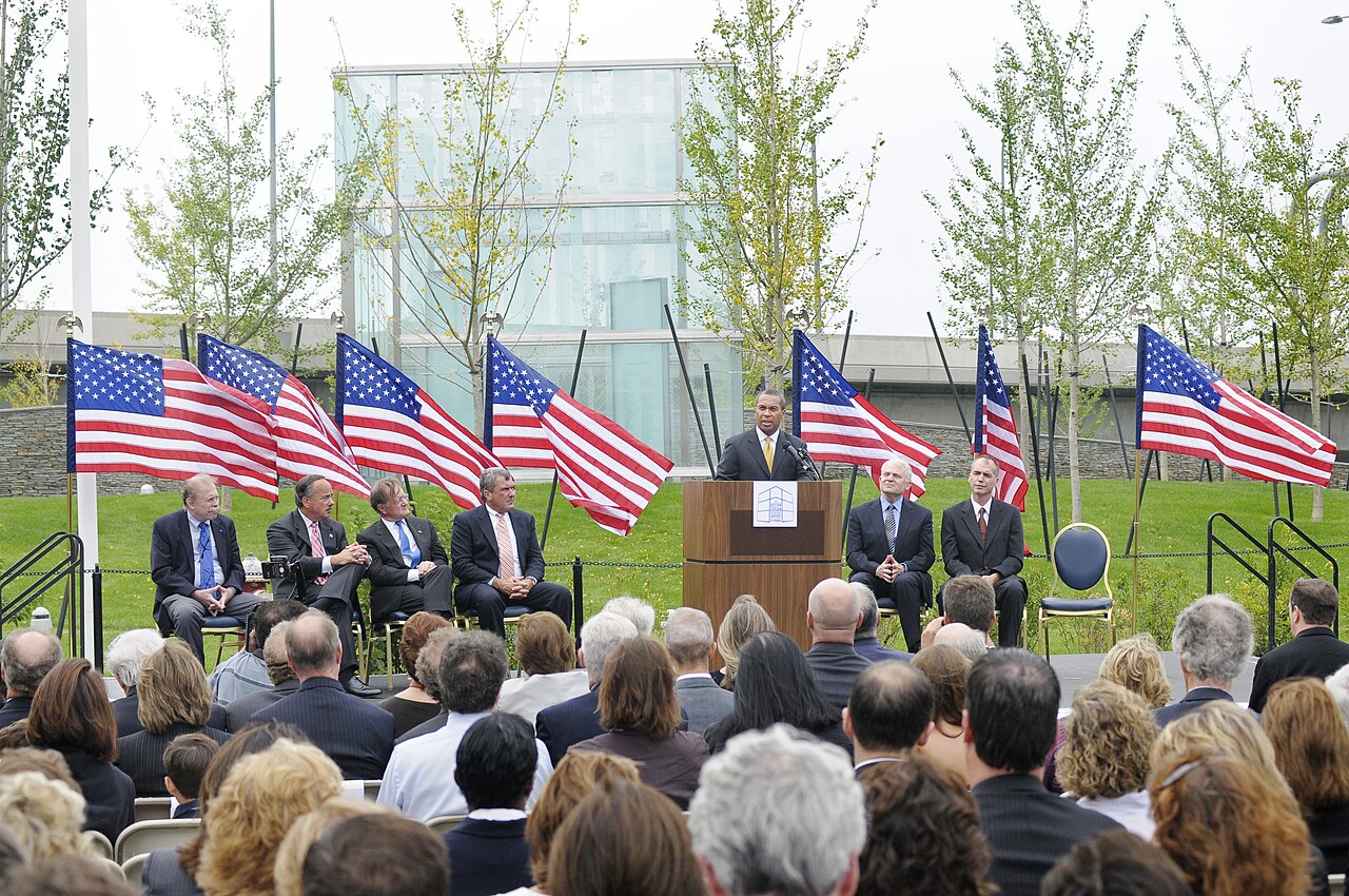 "On Tuesday, September 9, 2008, Governor Deval Patrick attended the unveiling of the Boston Logan International Airport 9/11 Memorial. The memorial remembers the events of September 11, commemorates the passengers and crews of American Airlines Flight 11 and United Airlines Flight 175, and honors the contributions and dedication to duty of the Logan Airport community."