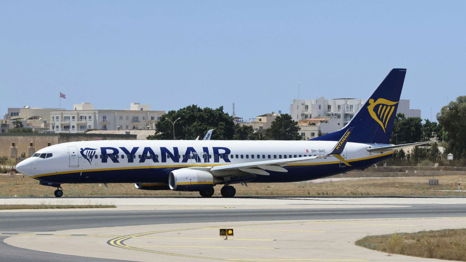 Ryanair passenger plane taxiing on runway, representing the budget airline often criticized for unhelpful flight crews.