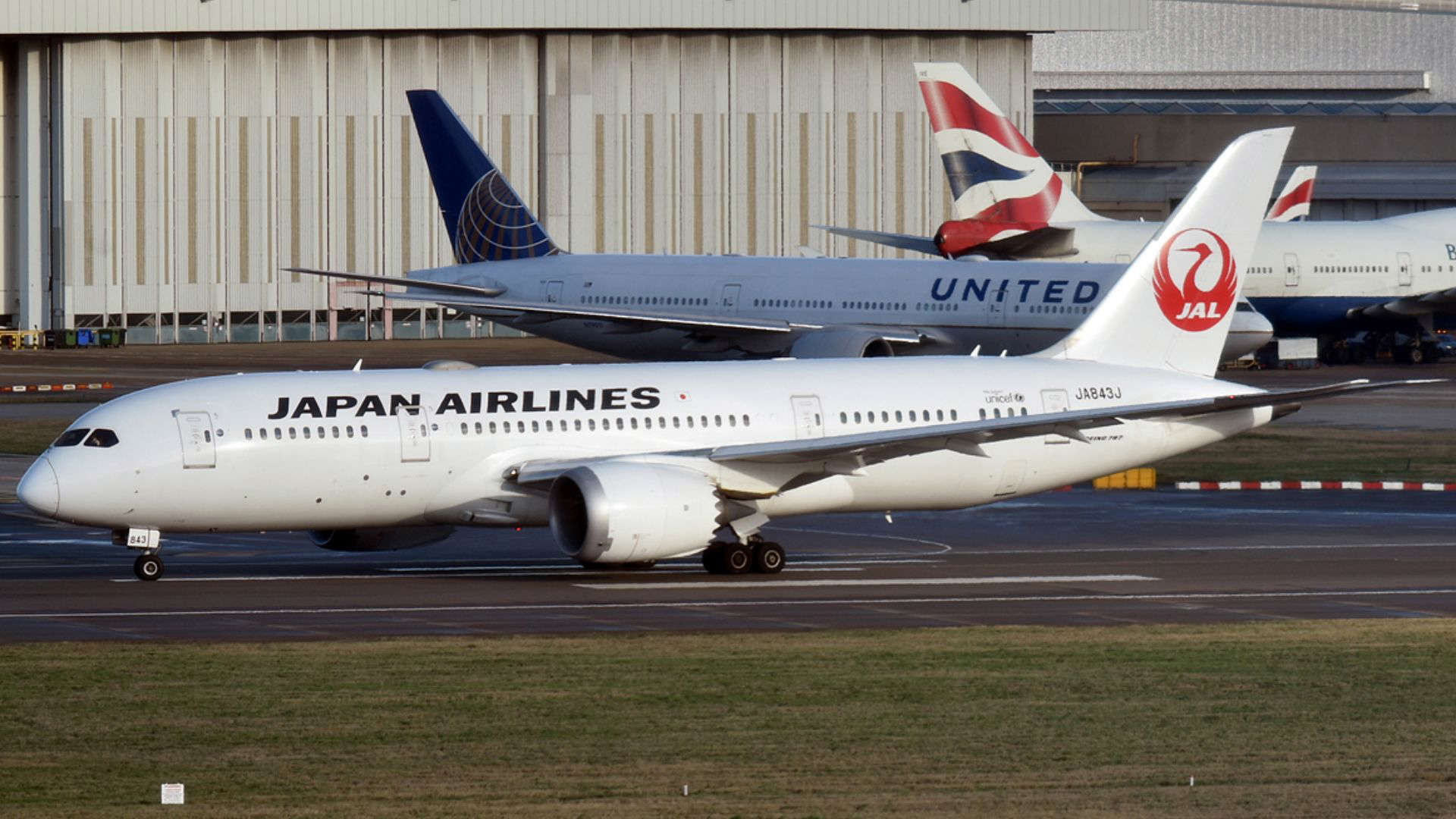 Japan Airlines plane on runway, representing the carrier’s reputation for exceptional service and outstanding flight crews.
