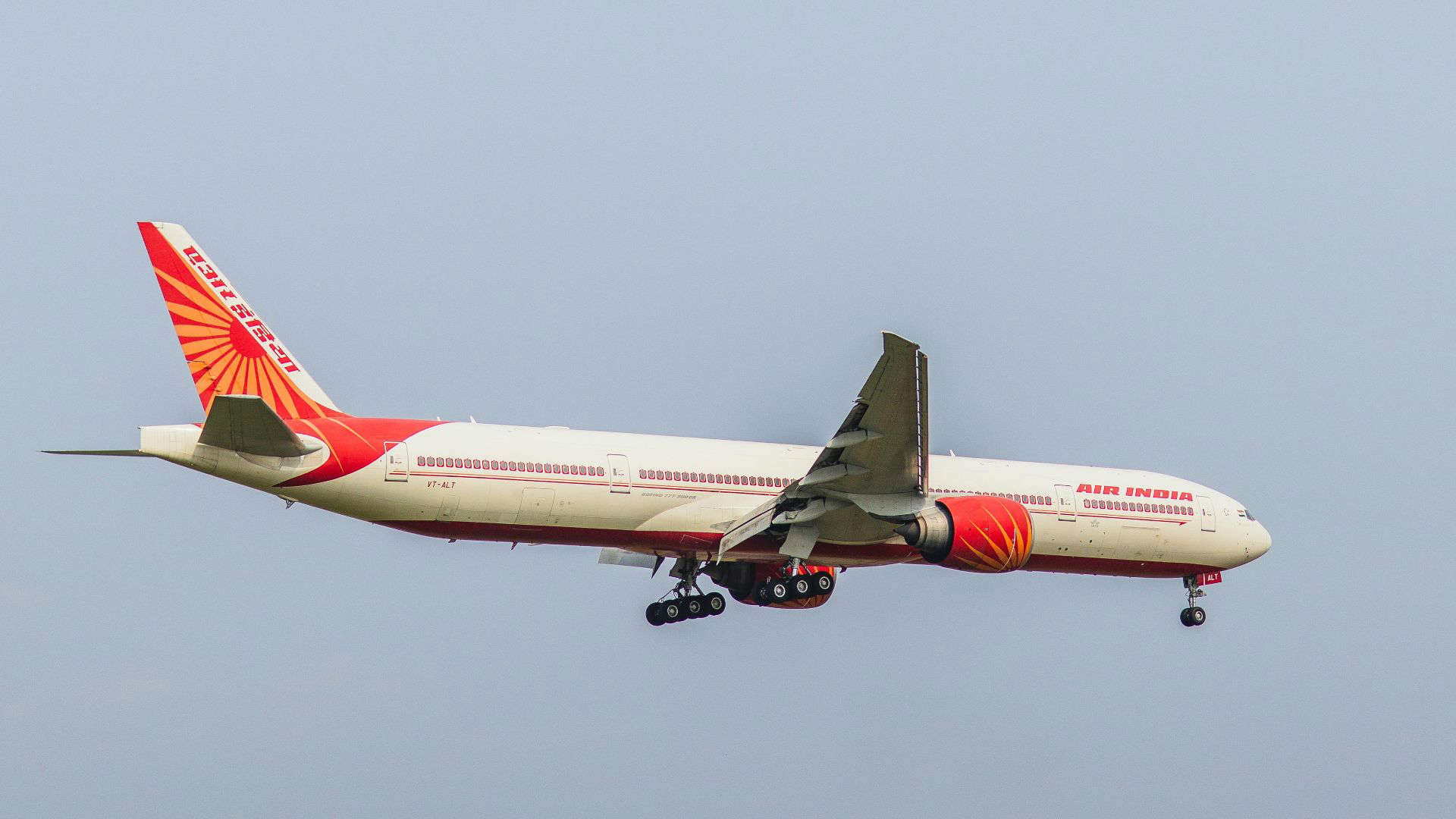 Air India plane in flight, representing the airline often criticized for poor cabin crew service and lack of passenger attention.
