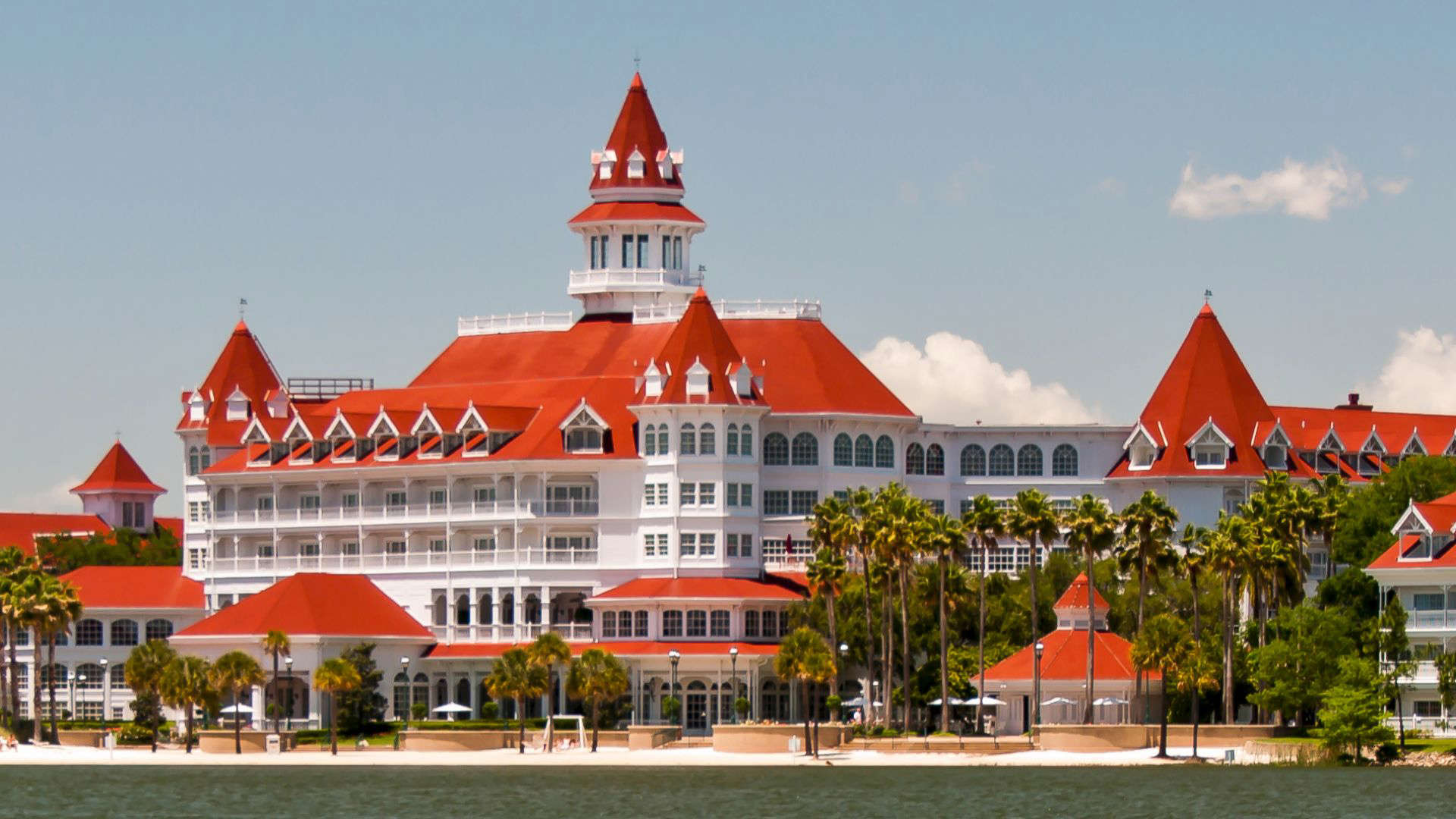 Disney’s Grand Floridian Resort exterior with Victorian architecture and red rooftops, an overhyped Disney World hotel that looks impressive but often feels overcrowded and overpriced