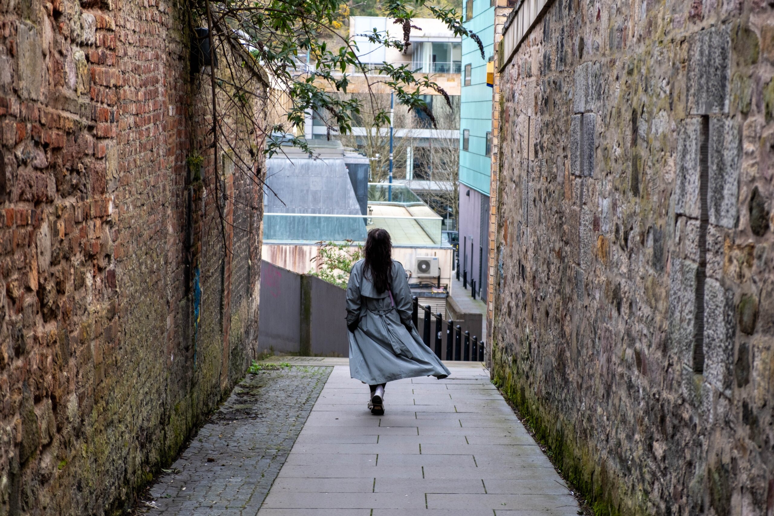 Woman walking through Edinburgh
