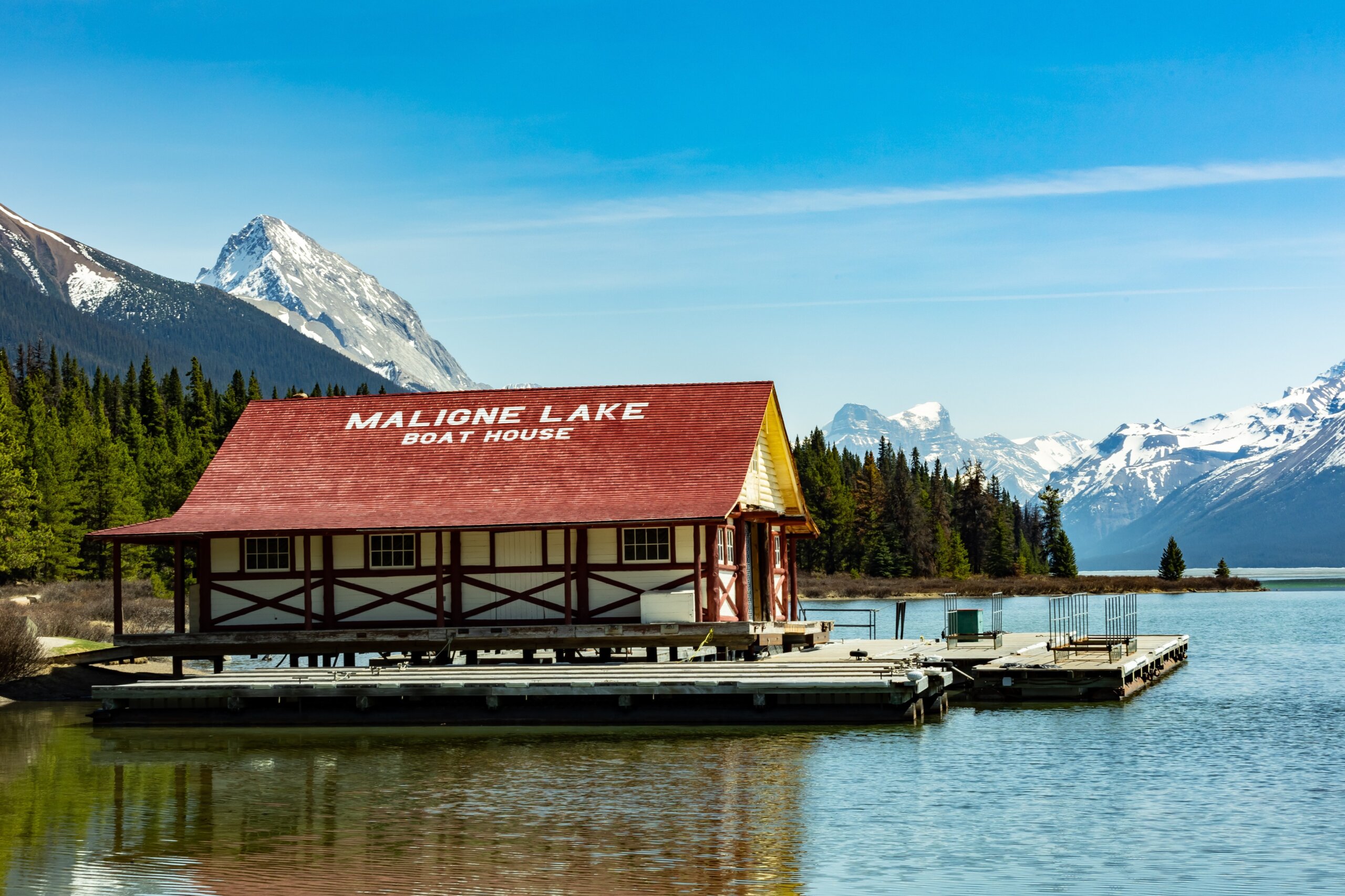 Maligne Lake Boat House with mountain backdrop in Jasper National Park, Alberta, Canada.