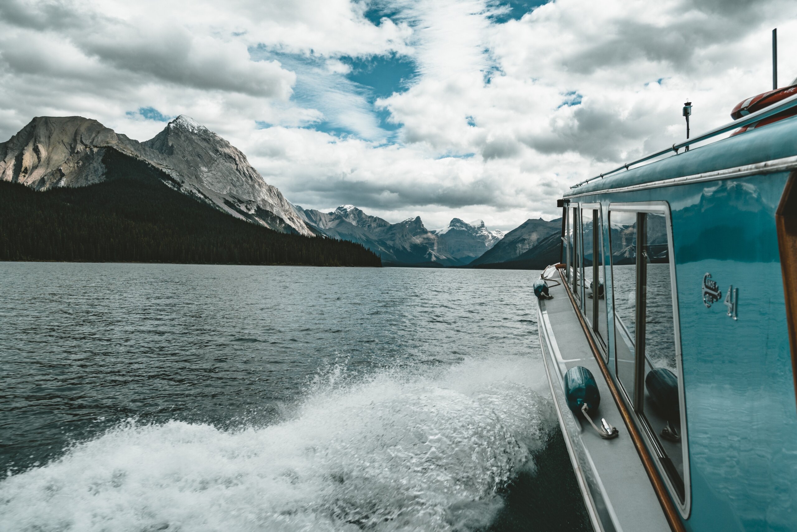 Boat tour Grand Panorama of Surrounding Peaks at Maligne Lake, Jasper National Park.