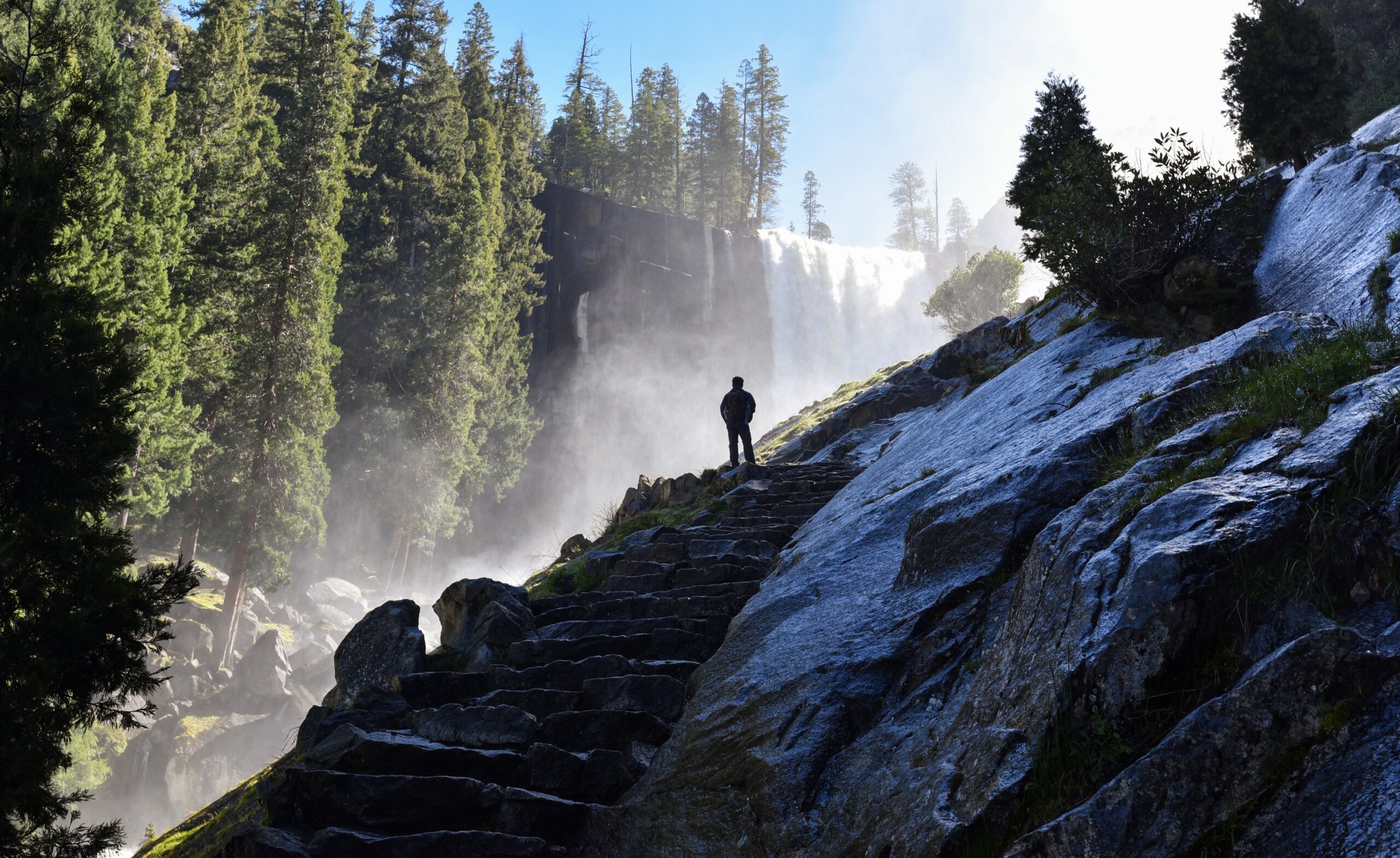 Silhouette of a man watching Vernal Falls in Yosemite National Park, California, USA.