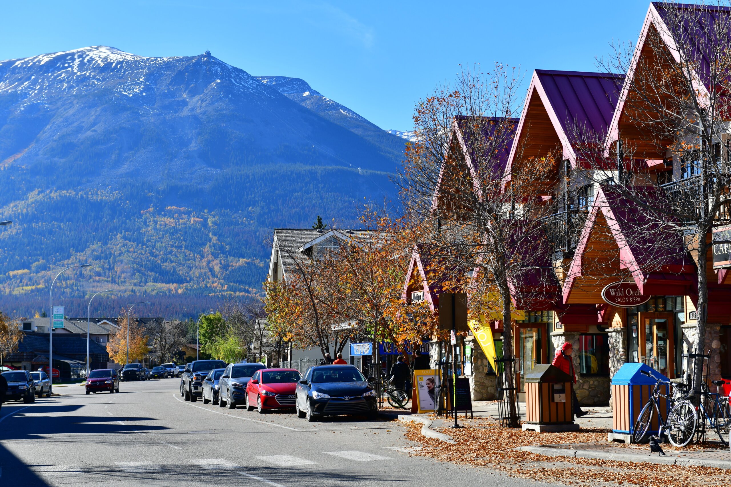 Jasper, Canada Oct 4,2017: Sunny day on streets of Jasper town, Canadian Rocky Mountains is a popular tourist destination.