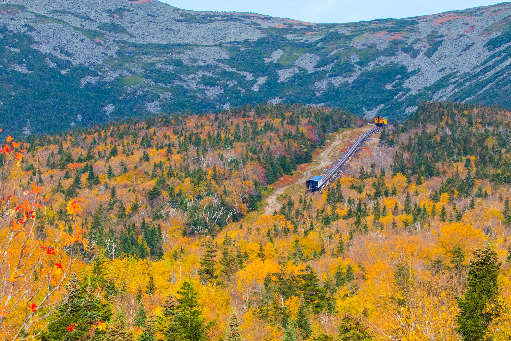 Mount Washington Cog Railway Cars Ascend to the Summit in Fall Colors