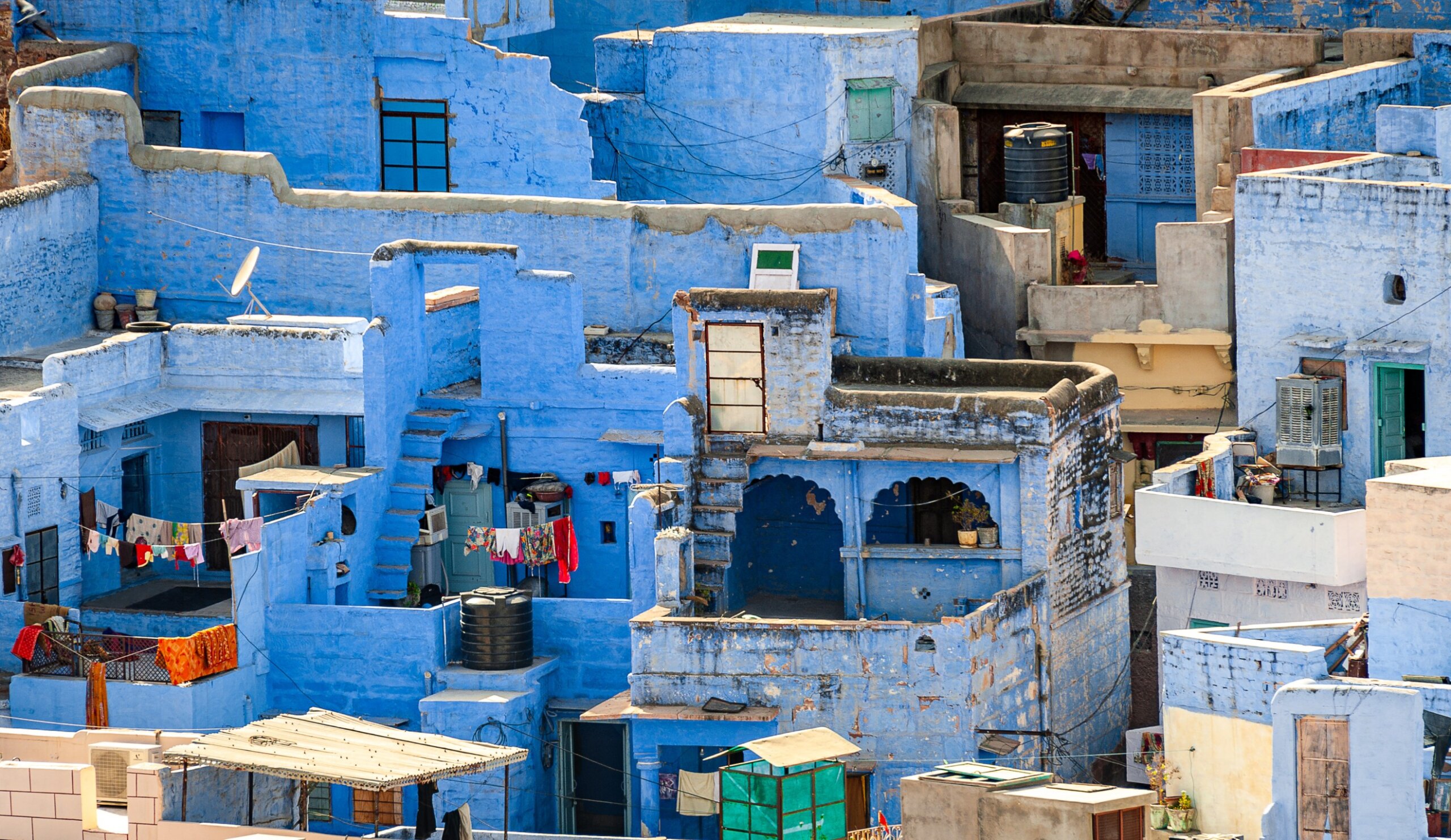 View of the blue houses in the old town of Jodhpur, India's Blue City, a famous tourist destination in Rajasthan and a Unesco World Heritage Site
