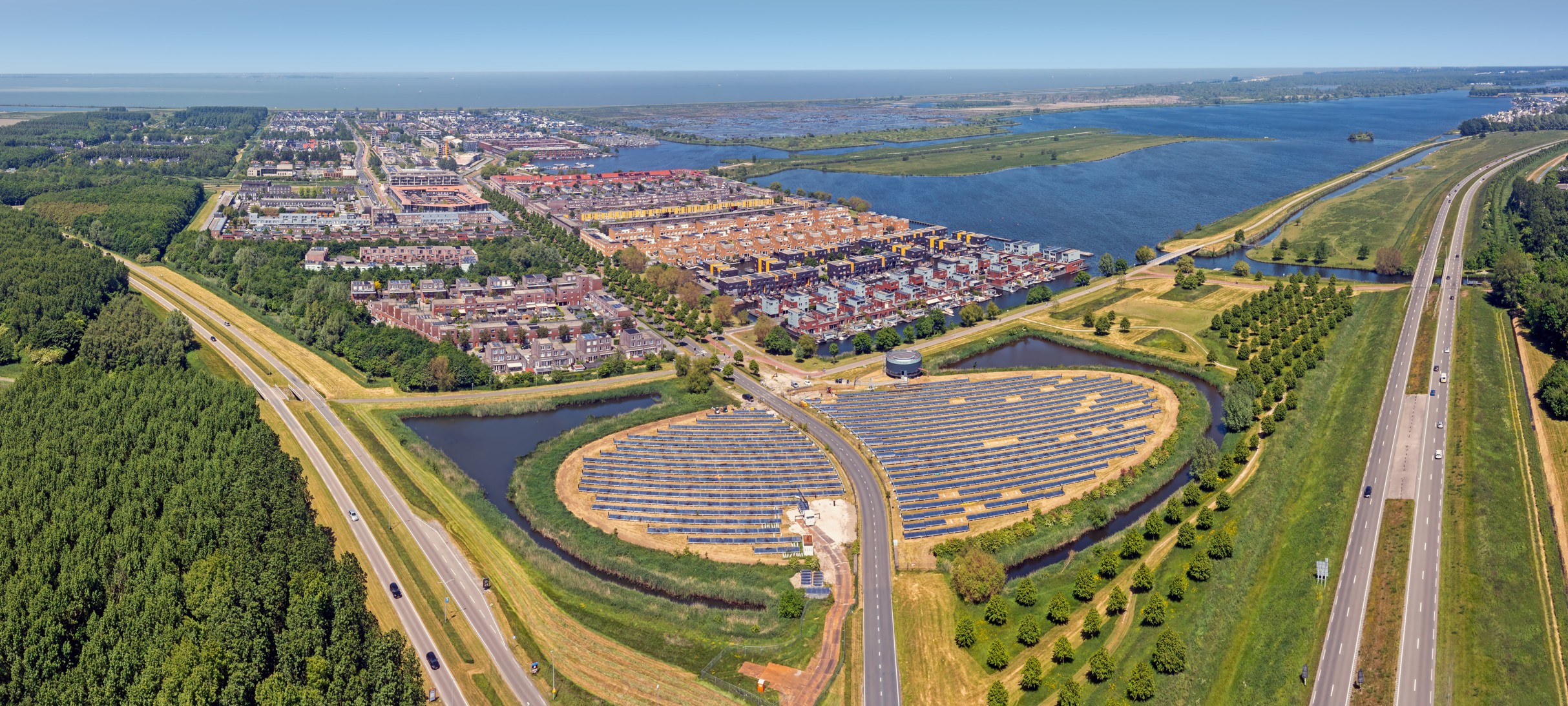 Aerial panorama from a solar Panel Farm with unique design in a form of an island at Almere Netherlands