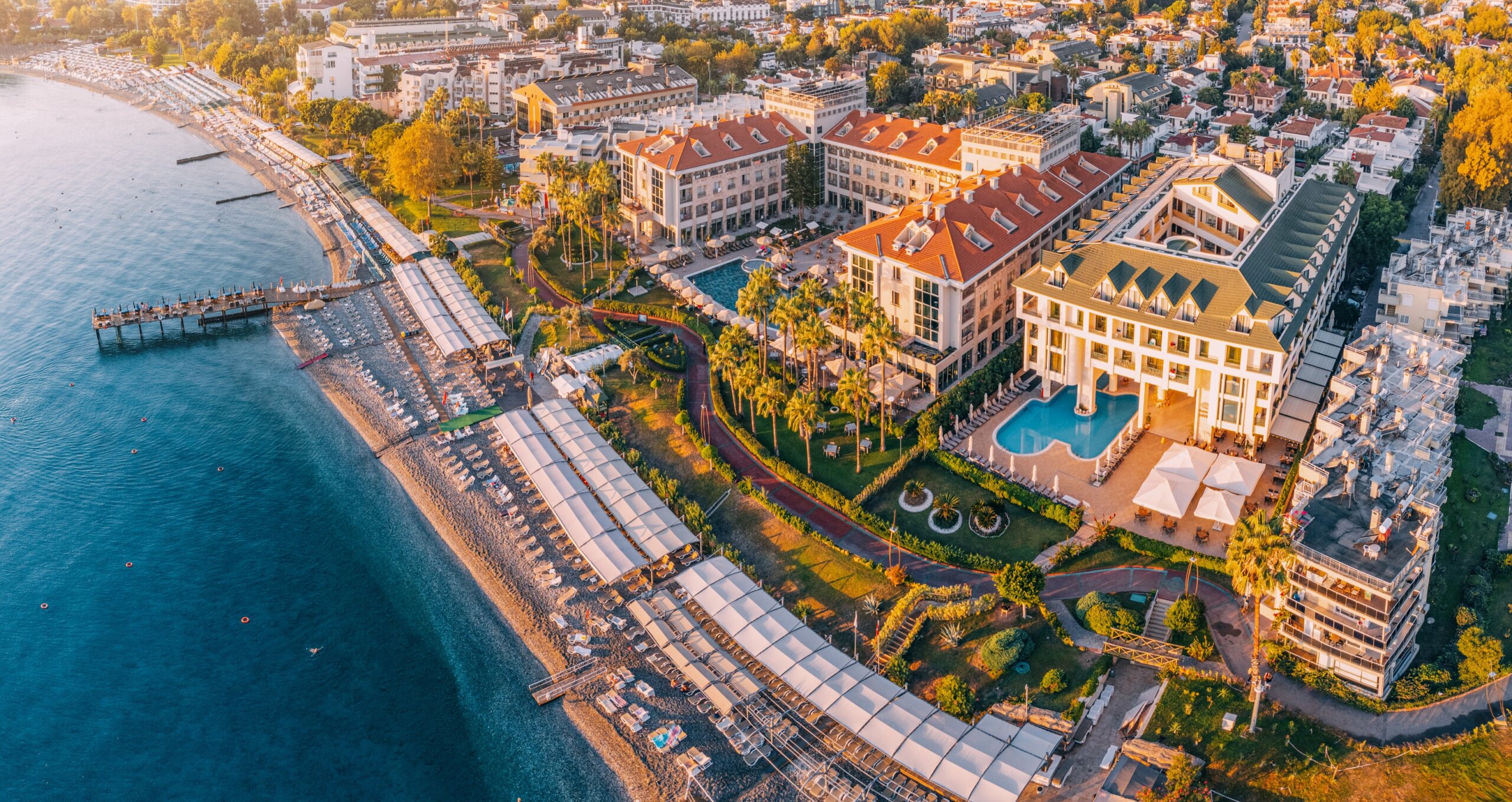 picturesque village resort Kemer in Turkey, boasting a hotels with enticing swimming pool, a stunning panoramic view from above.