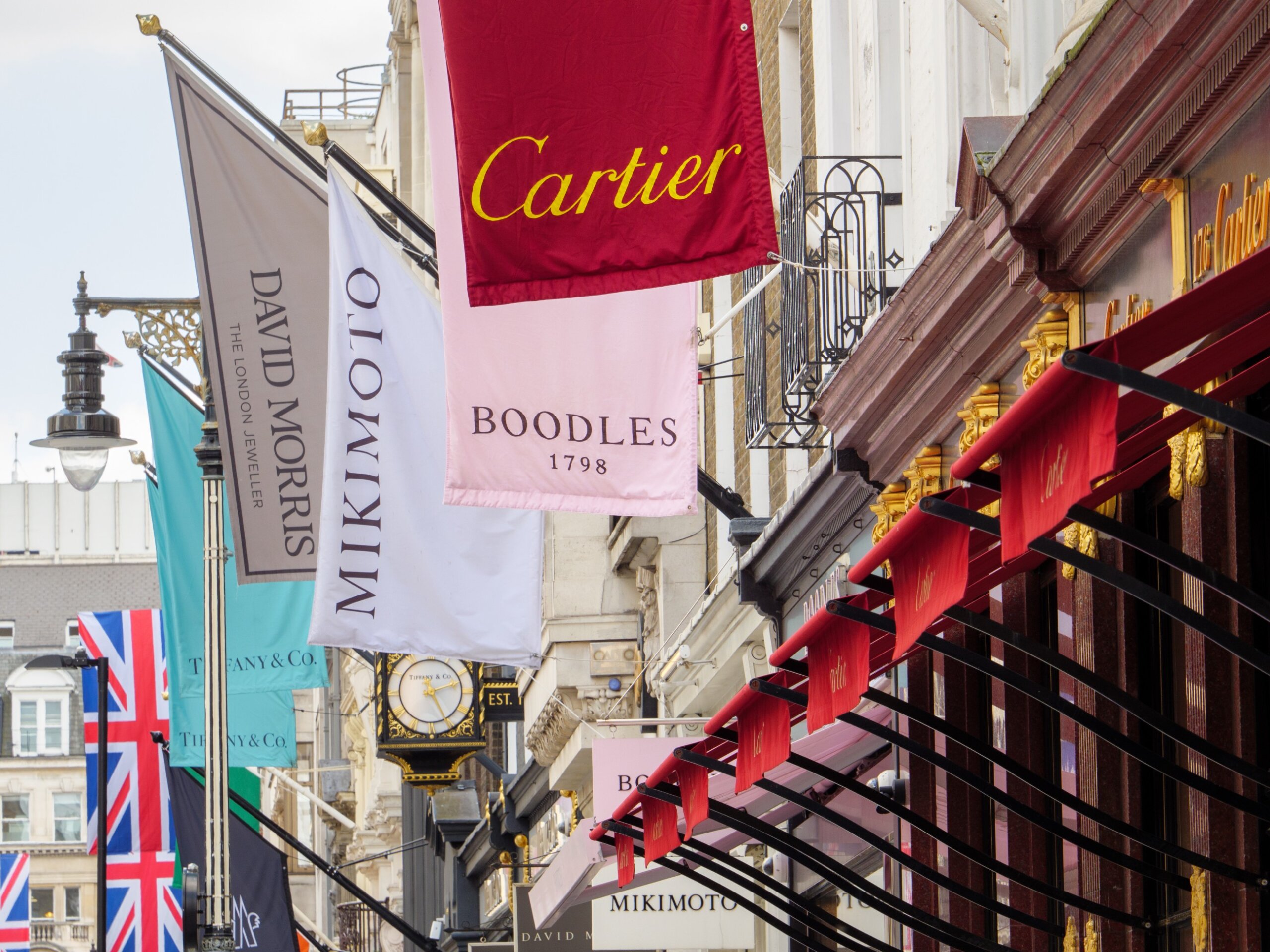 Upmarket shop signs on Bond Street in West End of London, UK