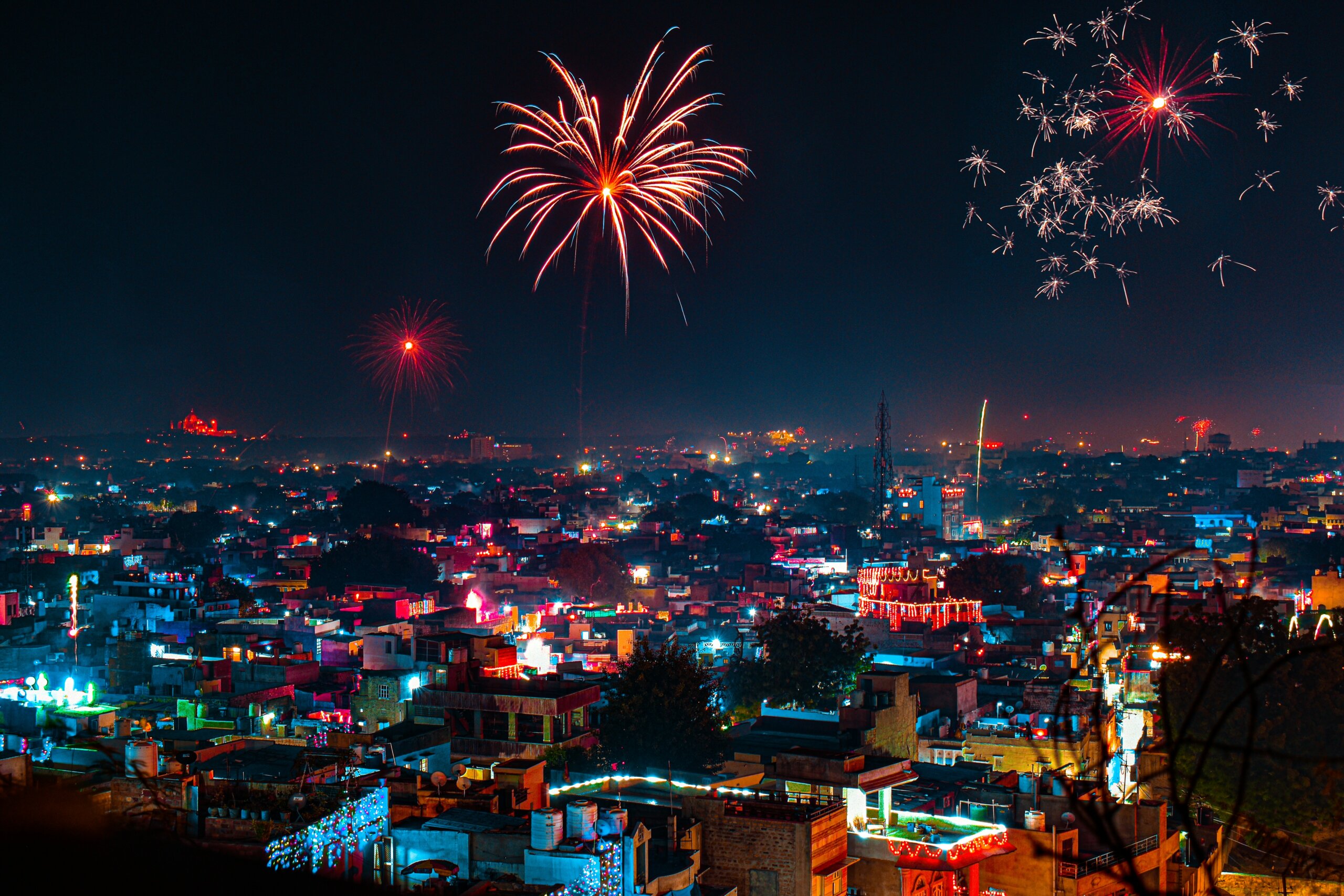 Fireworks over an Indian city during Diwali — showcasing the vibrant energy, colors, and celebrations of India’s famous festivals.