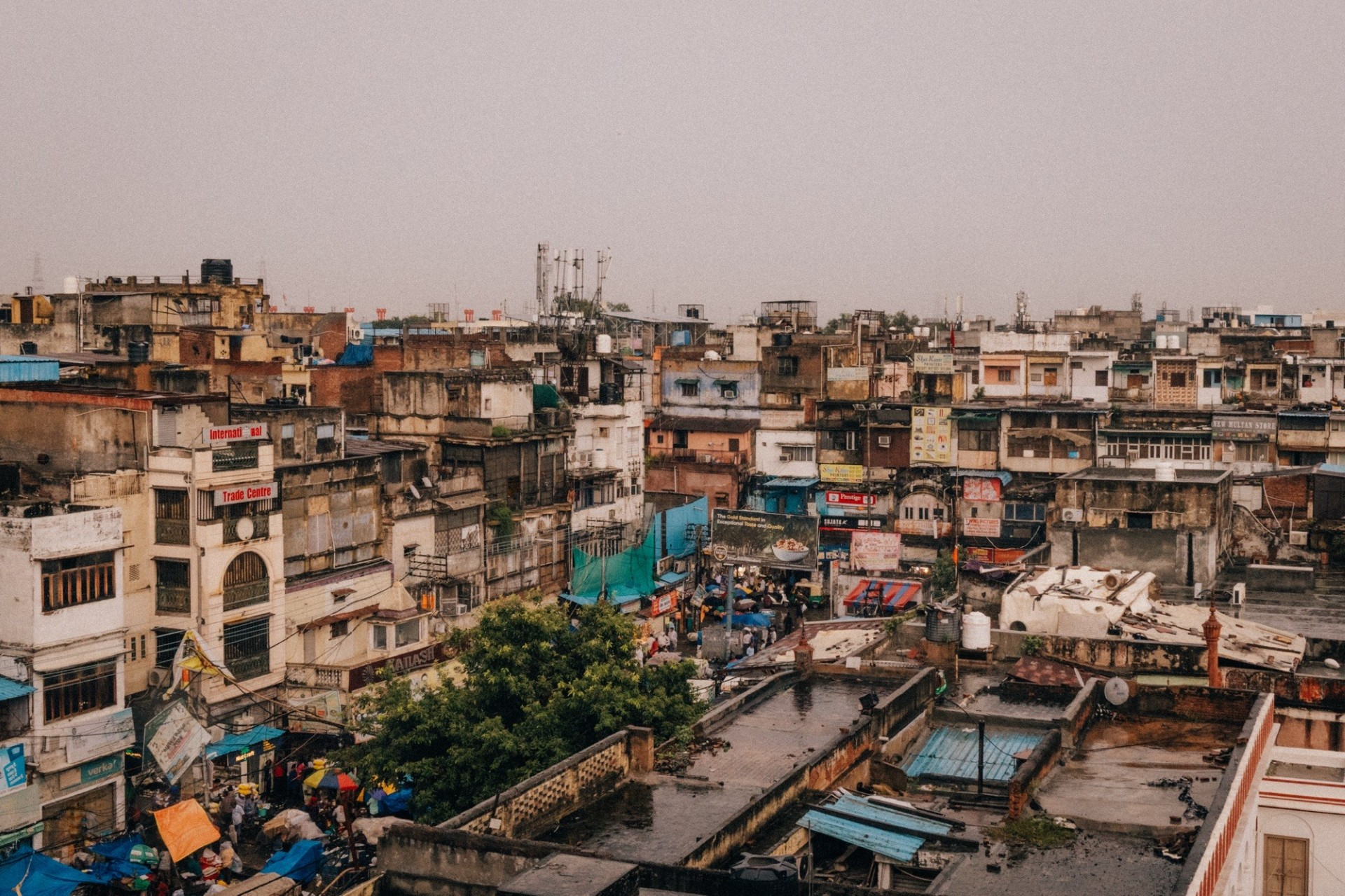 Rooftops and crowded streets of Old Delhi, India, highlighting the vibrant chaos of the city.