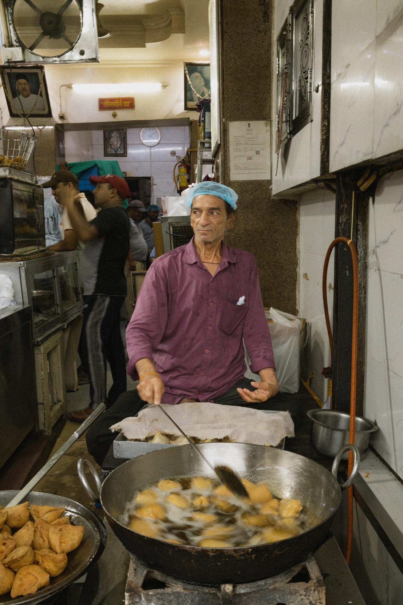 Street food vendor making samosas. 