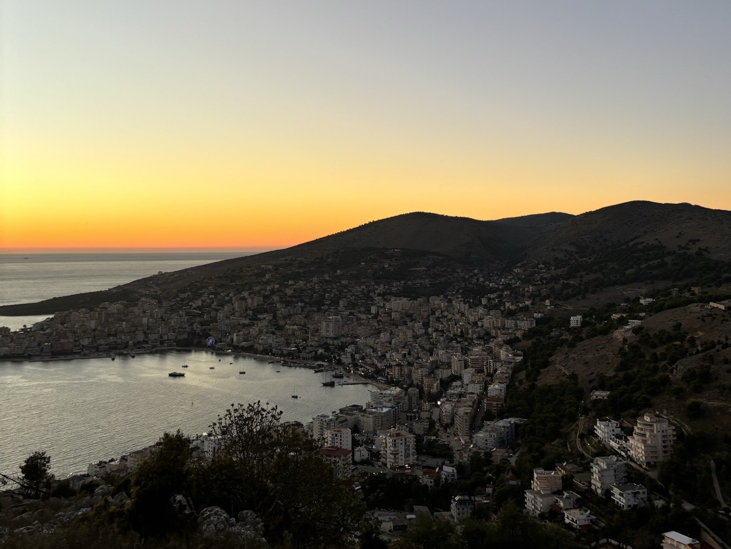View of Sarande from the castle at sunset. 

