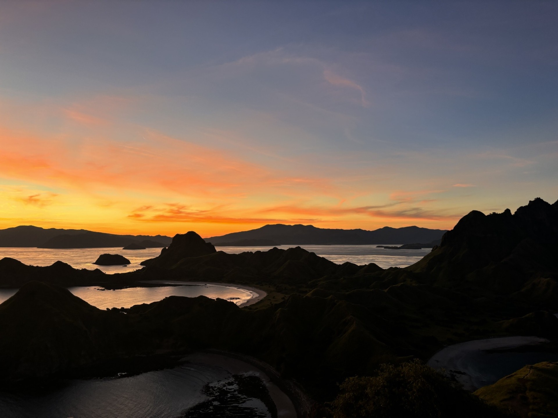 Beautiful sunset views from the top of the lookout on Padar Island. 