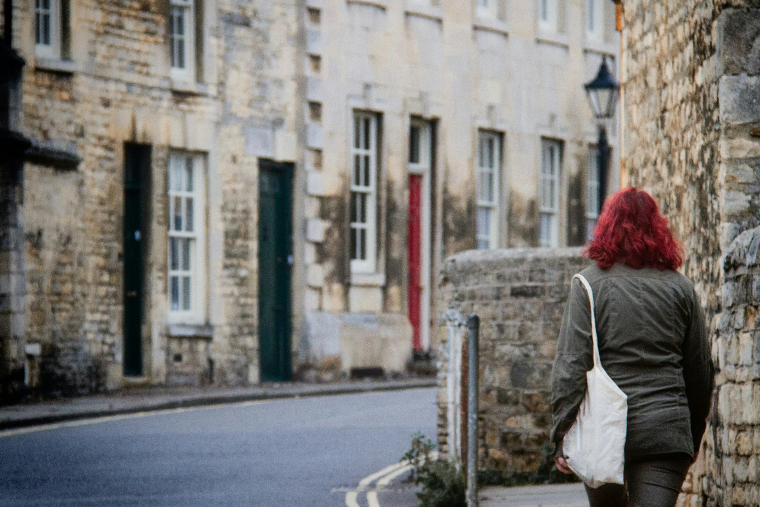 woman walking in a small town