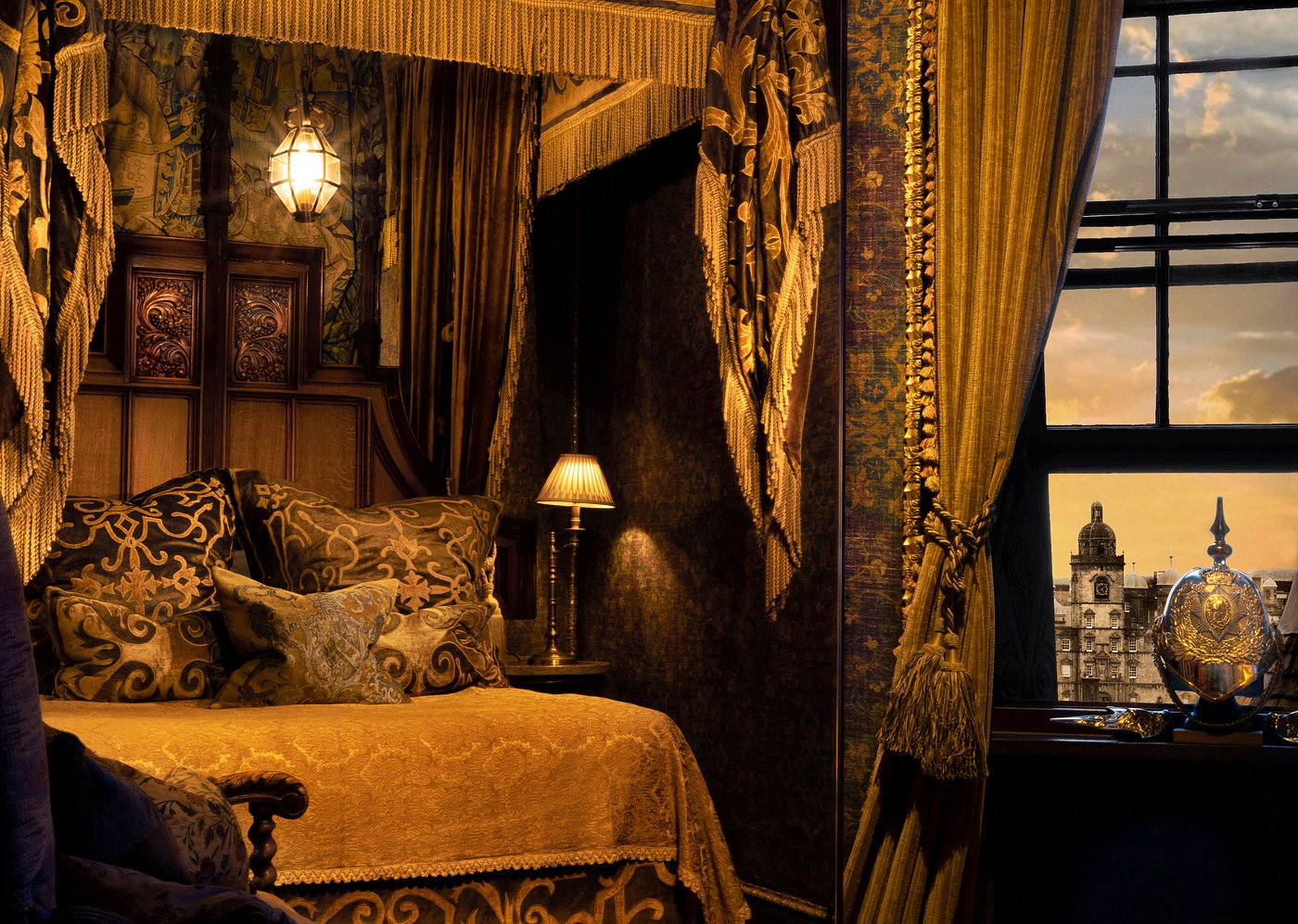 The Heriot Suite at The Witchery in Edinburgh with oak paneling, velvet four-poster bed, and gothic luxury décor.