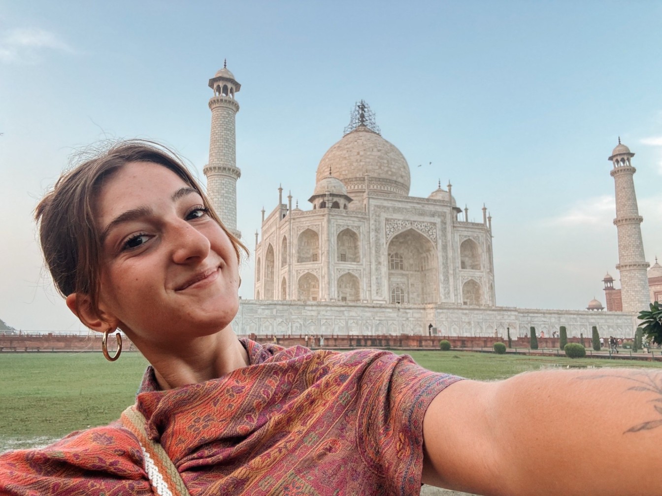 Backpacker taking a selfie at the Taj Mahal in Agra, India – Golden Triangle itinerary stop