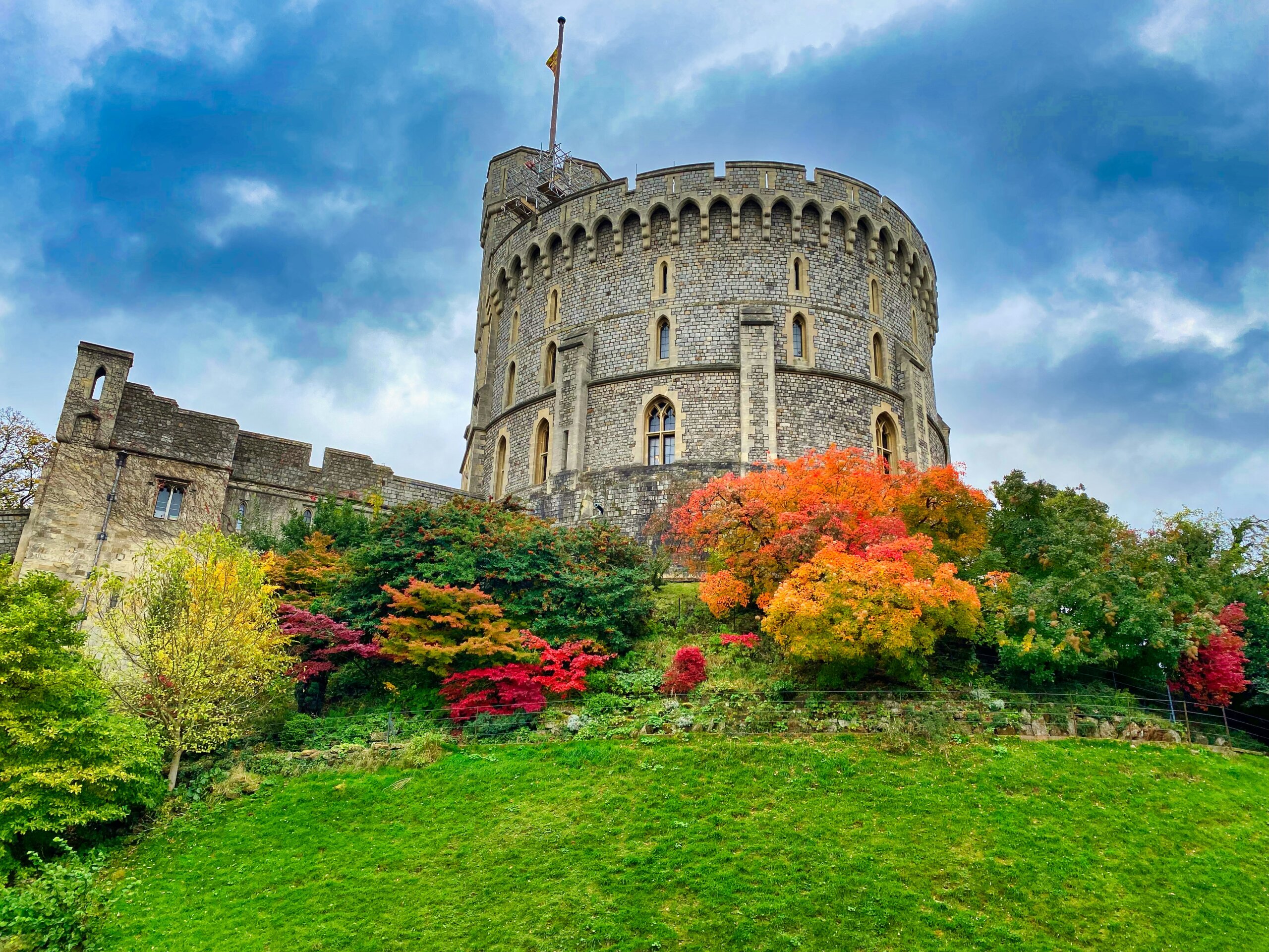 Windsor Castle in England with autumn trees, part of Britain’s royal castles you can visit in 2025
