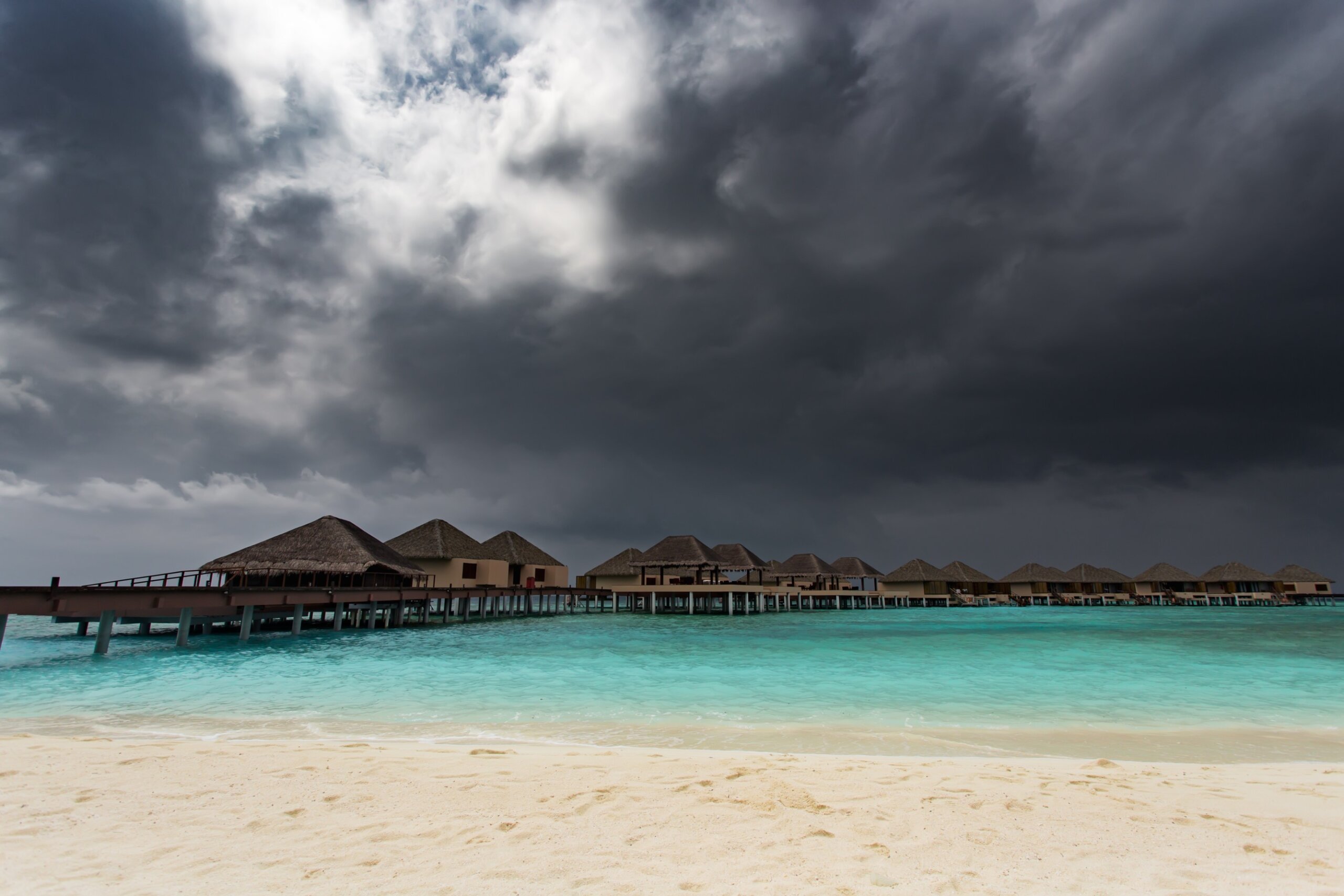 Water bungalows at rainy season. Maldives islands
