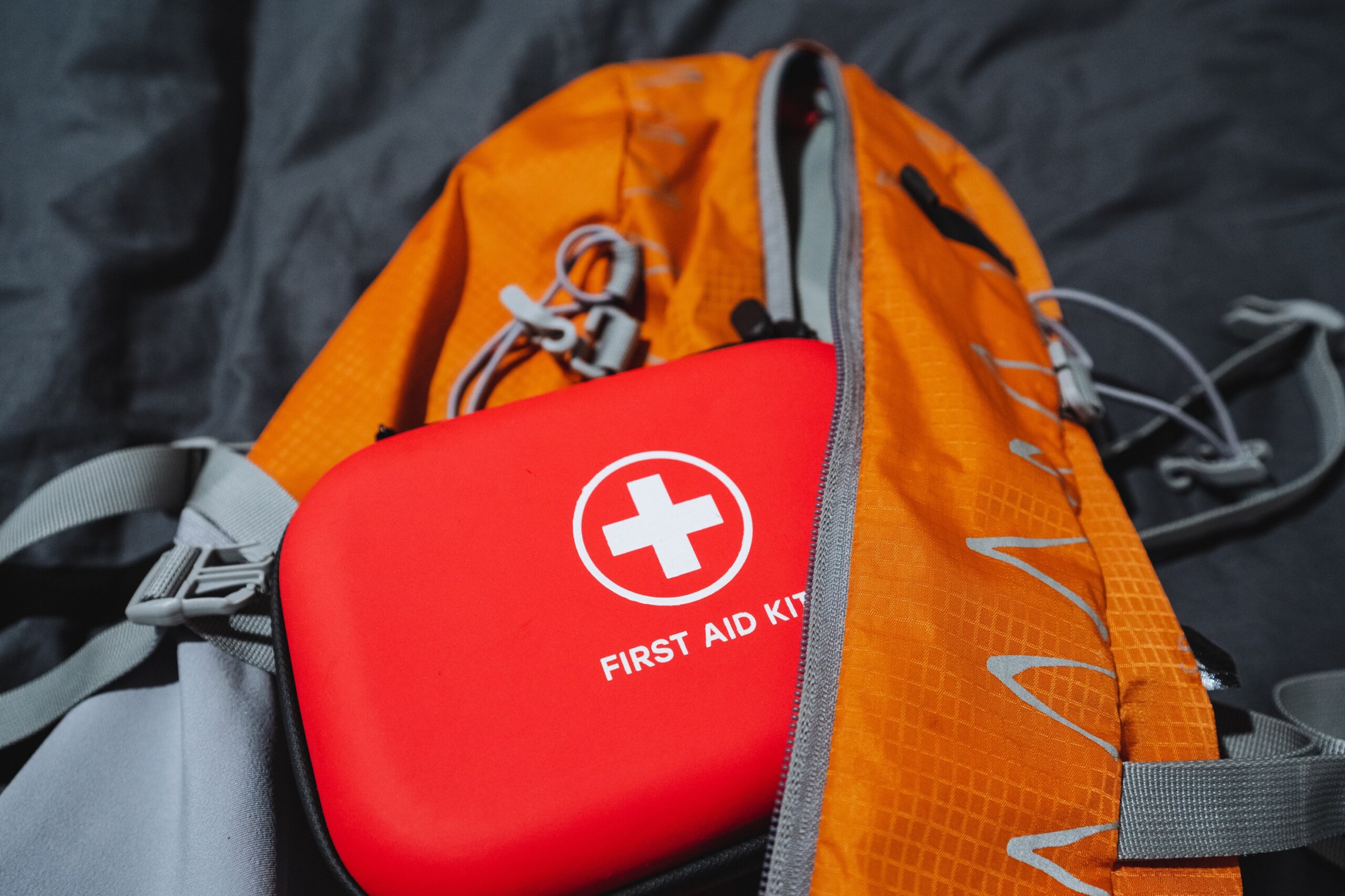 When embarking on outdoor adventures, it is crucial to have essential items packed, including a wellstocked first aid kit safely placed in your hiking backpack for any emergencies that may arise