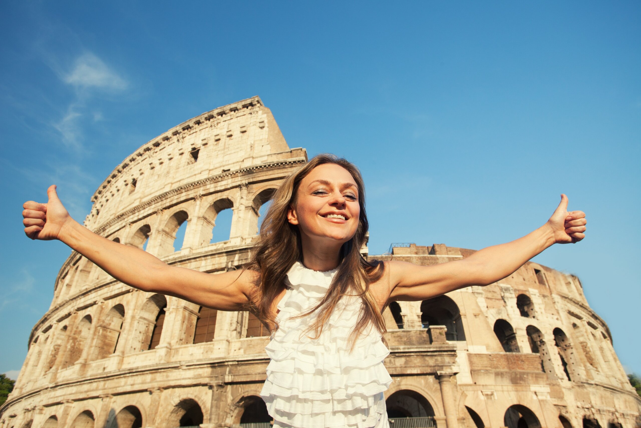 Woman on the background of the Colosseum