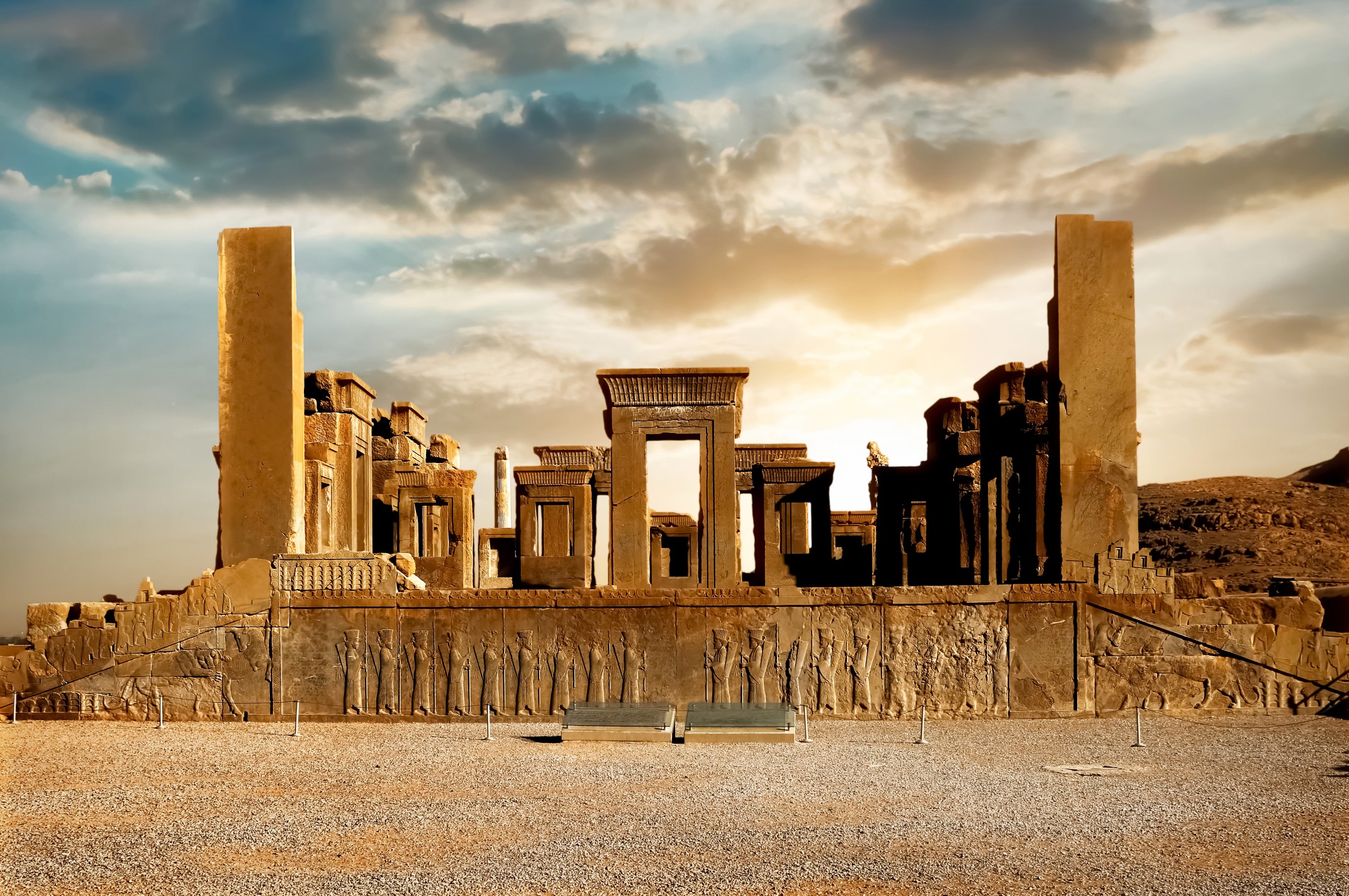 Sunrise in Persepolis, capital of the ancient Achaemenid kingdom. Ancient columns. Sight of Iran. Ancient Persia. Beautiful sunrise background. - one of the world’s most earthquake-prone regions.
