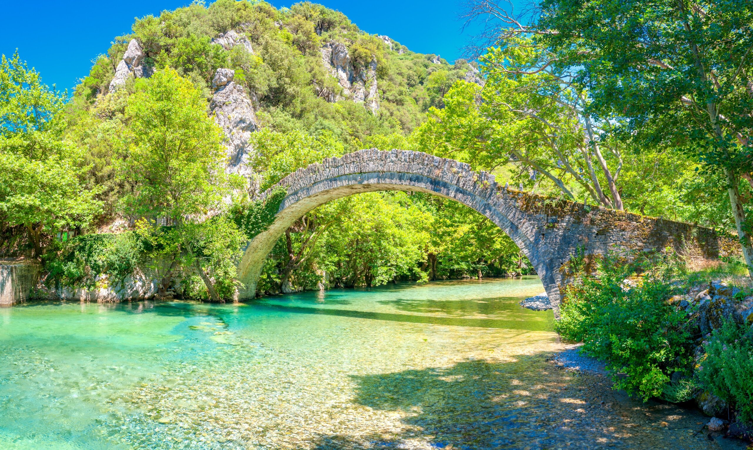 View of the old stone bridge Noutsos located in central Greece, Zagori, Europe
