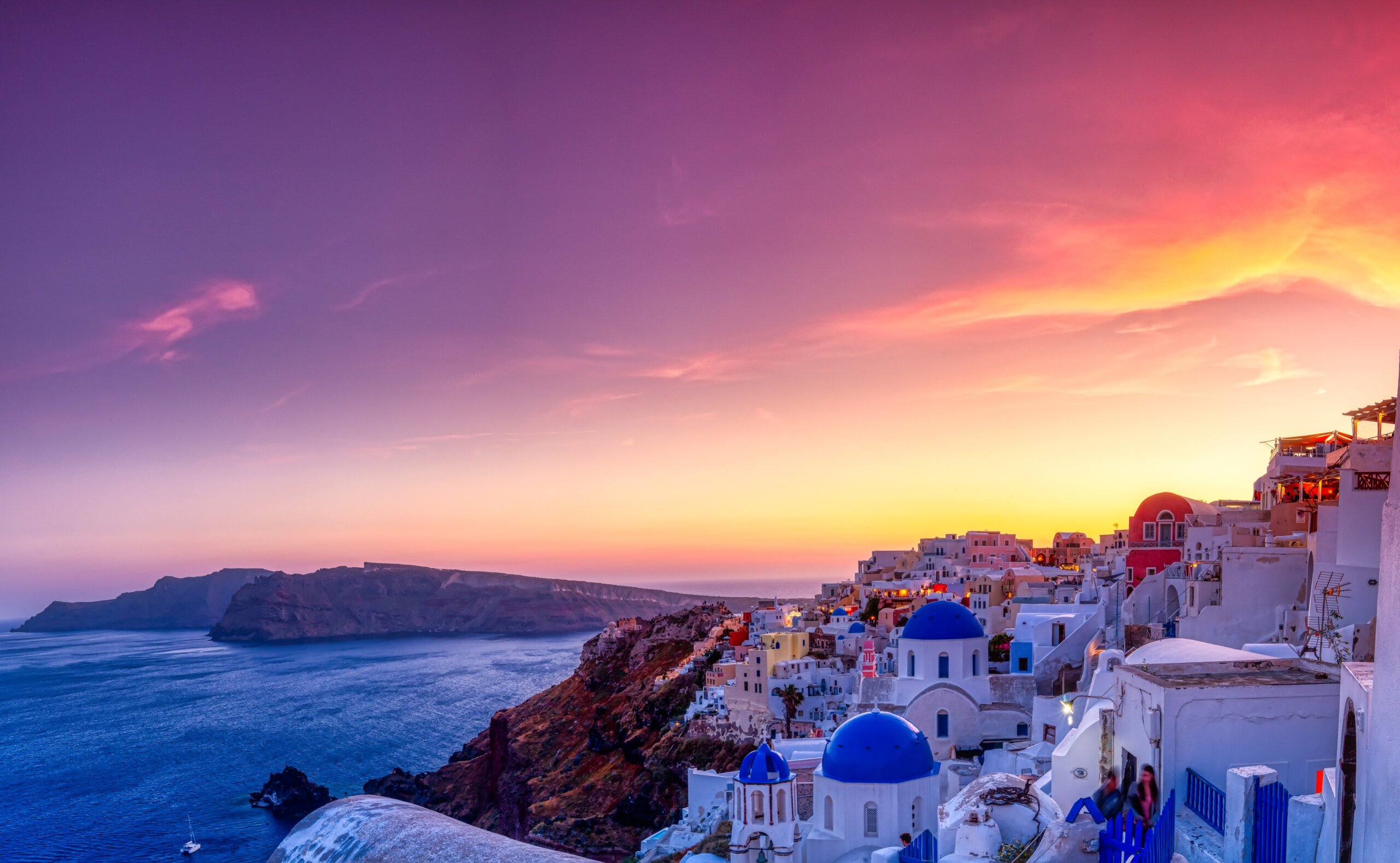 Oia village in Santorini island at sunset in Greece - one of the world’s most earthquake-prone regions.
