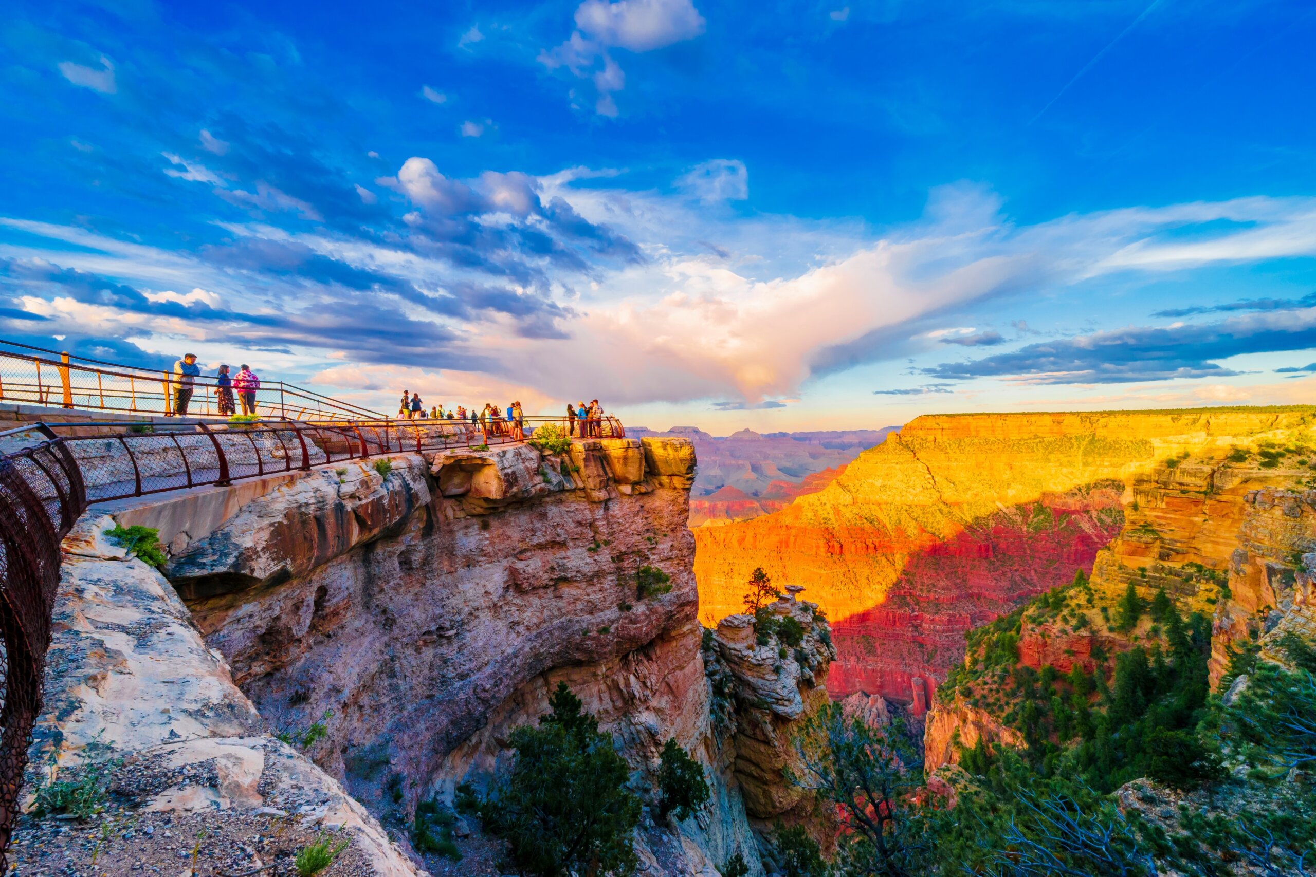 Panoramic image of the colorful Sunset on the Grand Canyon in Grand Canyon National Park from the south rim part,Arizona,USA, on a sunny cloudy day with blue or gloden sky