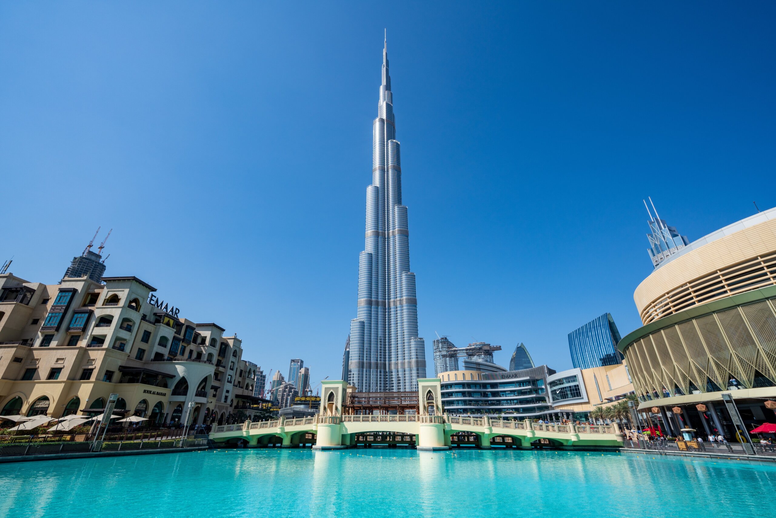 Dubai / UAE - February 2019: The Burj Khalifa and the Dubai Mall at daytime.