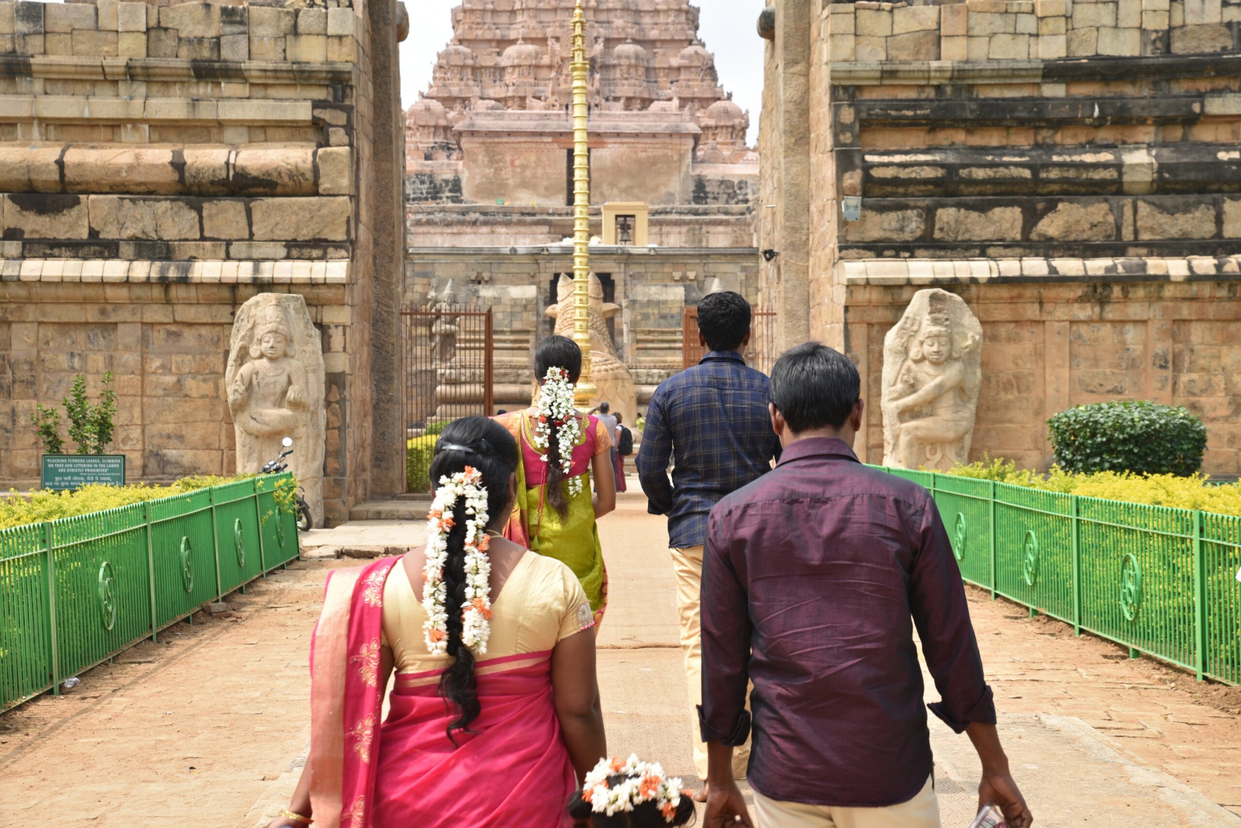 Group of people walking to temple in India