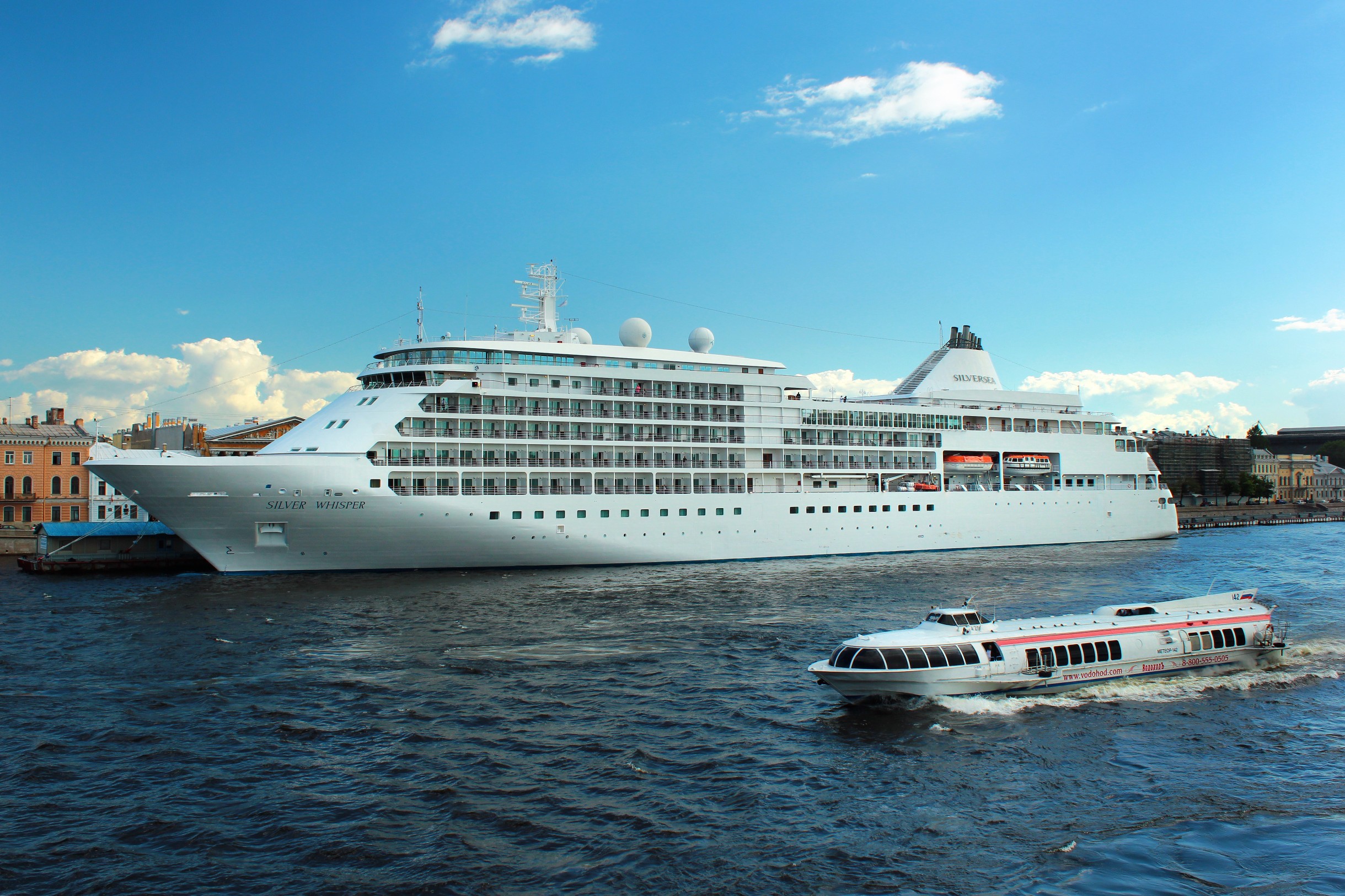 SAINT PETERSBURG, RUSSIA - JULY 4, 2017: Silver Whisper cruise ship at Saint Petersburg's English Embankment pier on Neva river.
