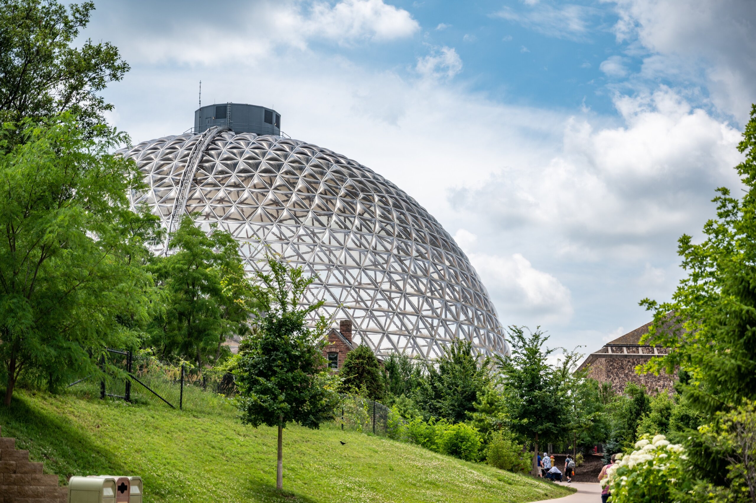 Omaha, Nebraska, USA: 6-2021: Desert Dome against an open sky at the Henry Doorly Zoo and Aquarium
