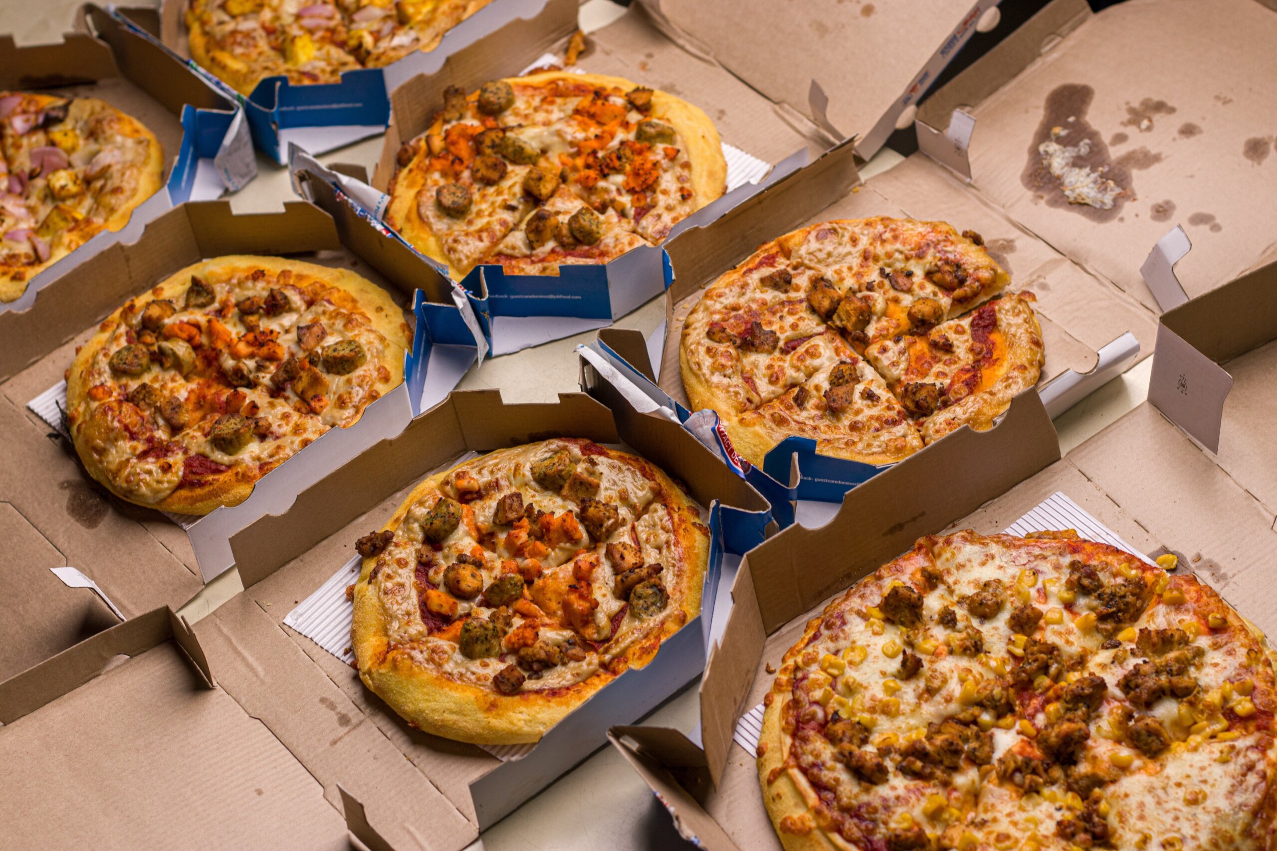 West Bangal, India - August 21, 2021 : Dominos pizza on box stock image.
