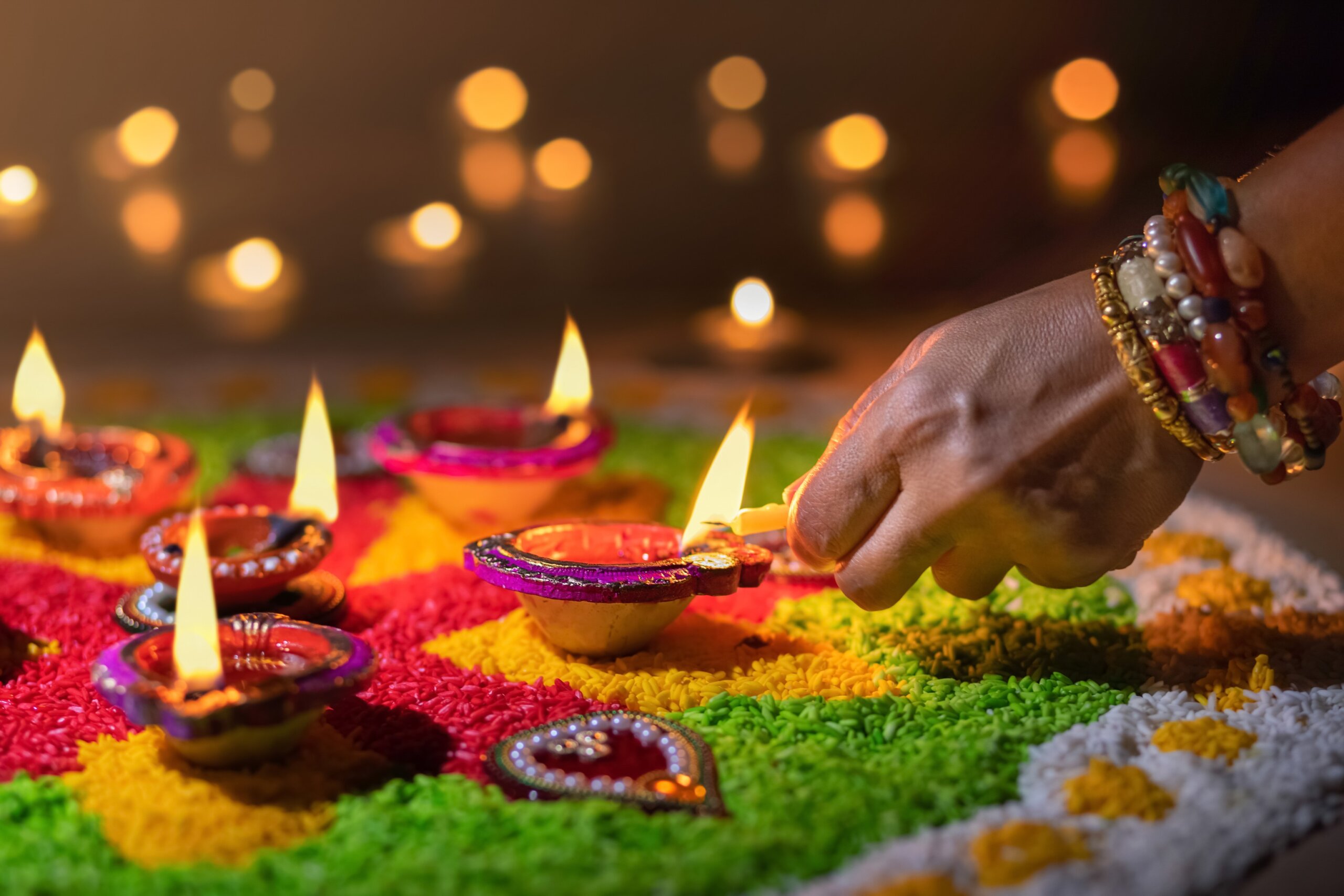 Traditional diya lamps lit during diwali celebration
