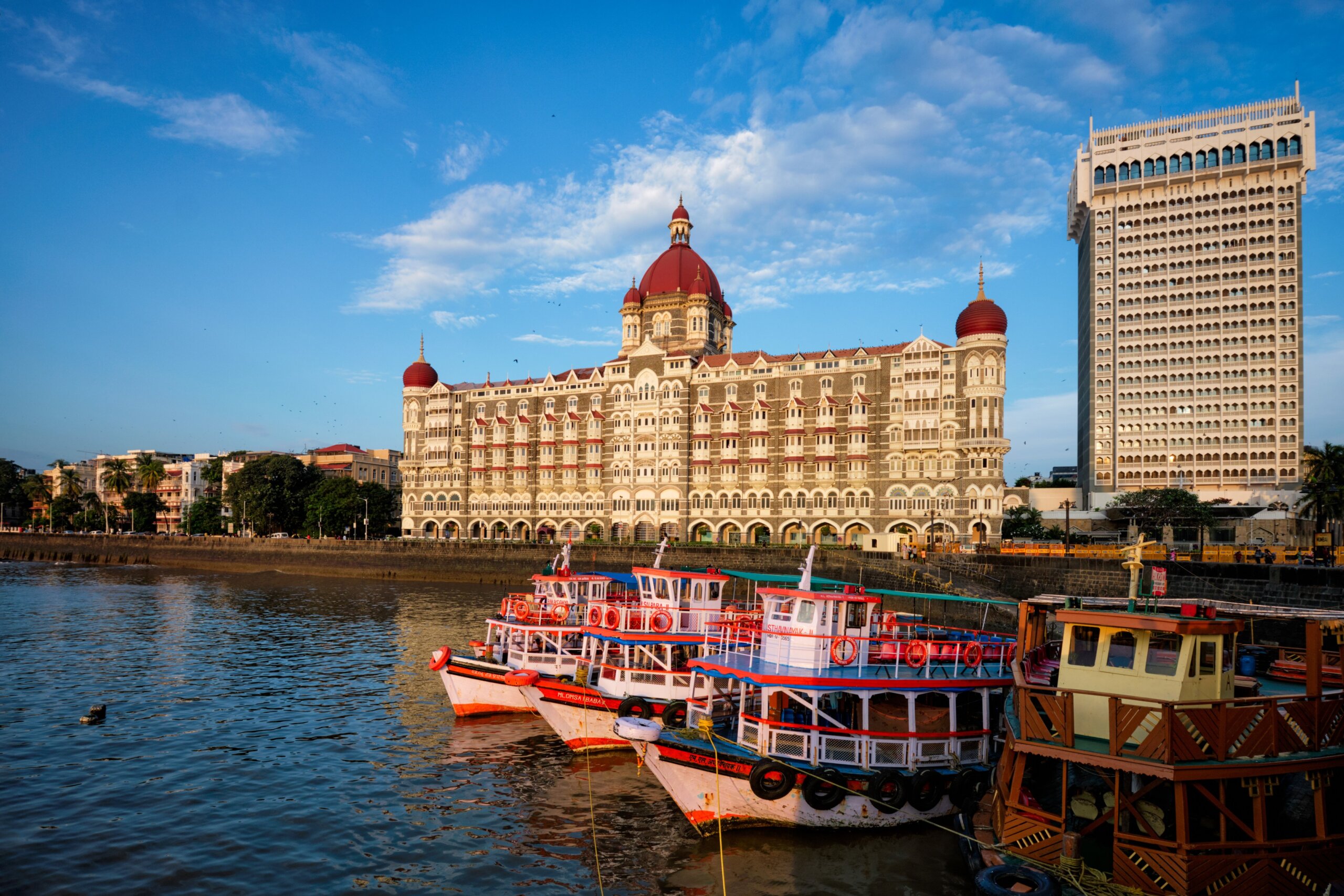 Tourist boats in front of the famous Taj Hotel in the morning

