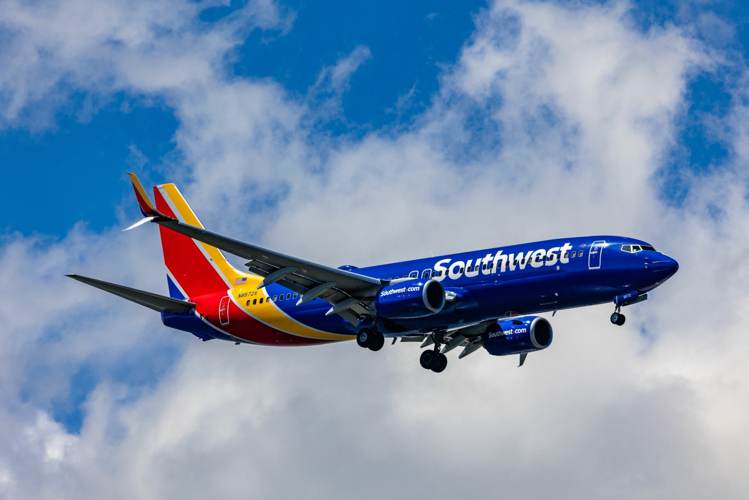 U.S. travel rules 2025: Southwest Airlines Boeing 737 plane during flight symbolizing the seating policy change for U.S. travelers