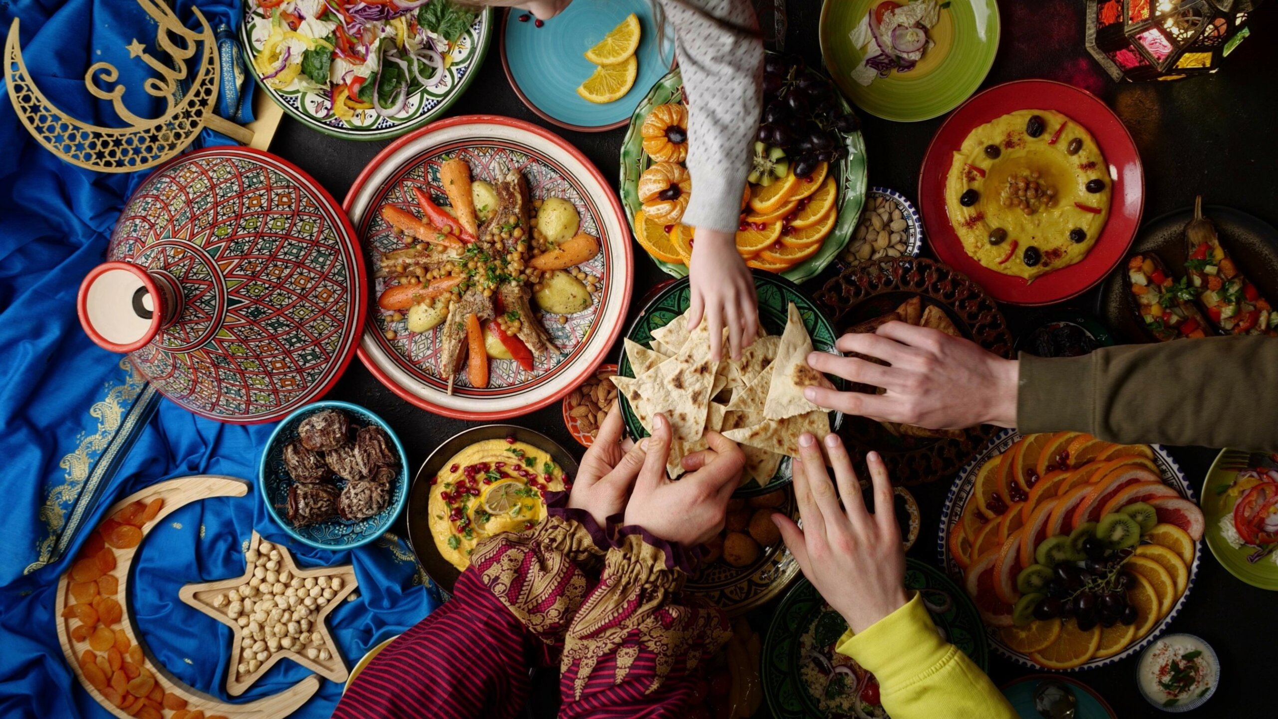 Eid holiday table. Ramadan family dinner. Breaking Fast, iftar. Arabic Middle Eastern traditional cuisine
