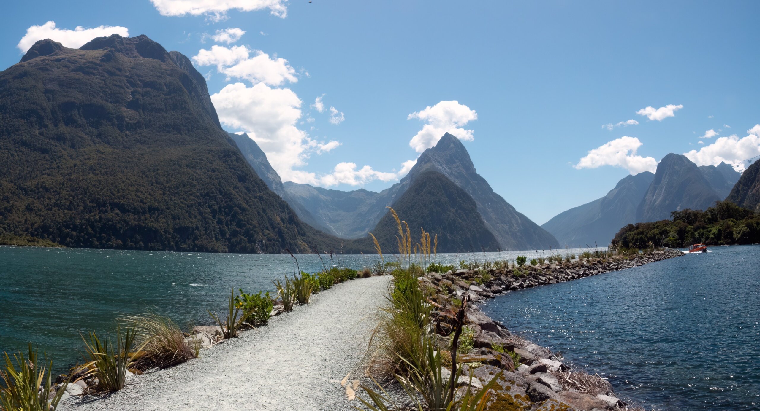 Milford Sound (Piopiotahi) fjord, Fiordland National Park in the south west of New Zealand's South Island. World heritage site among the world's top travel destinations. Also one of the world’s most earthquake-prone regions.