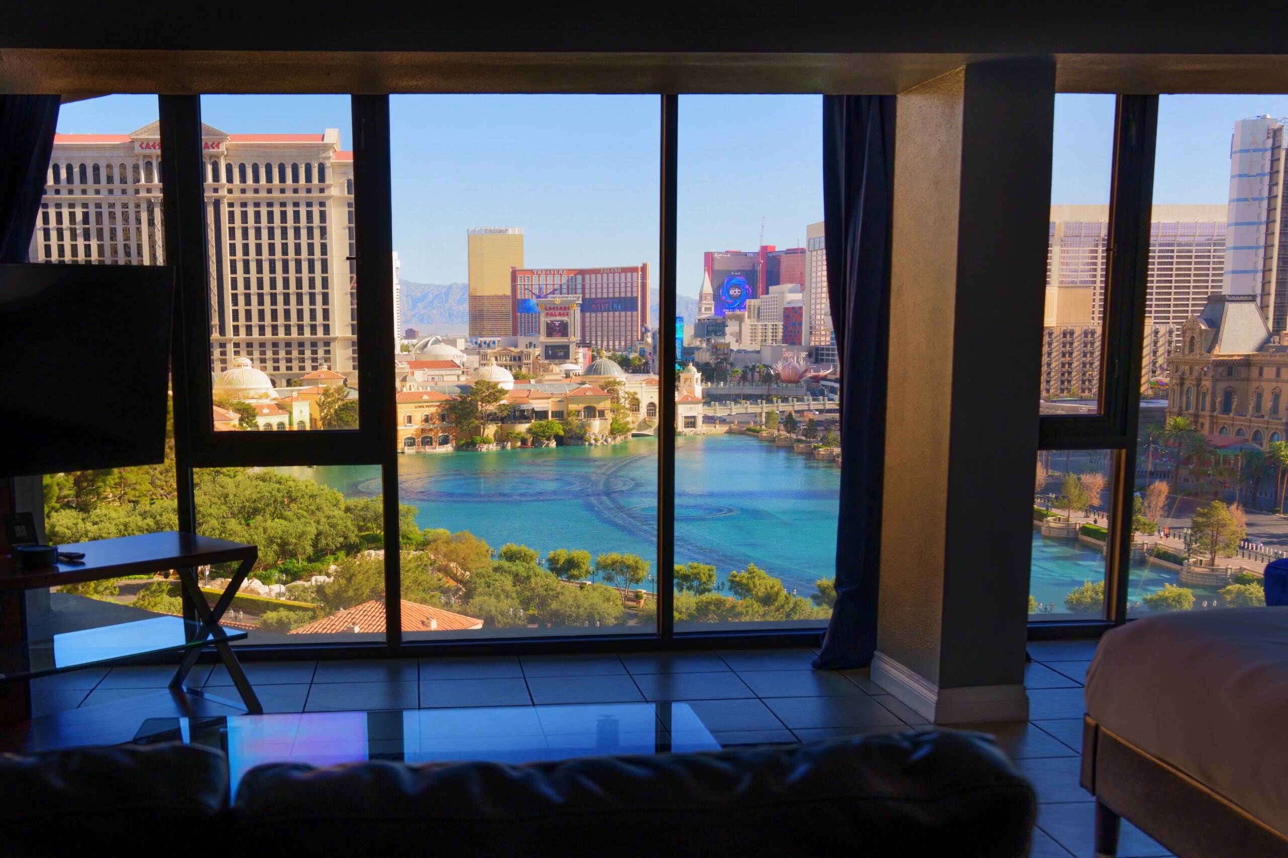  Daytime Hotel Room View of the Caesars Palace and Bellagio Fountains Lake