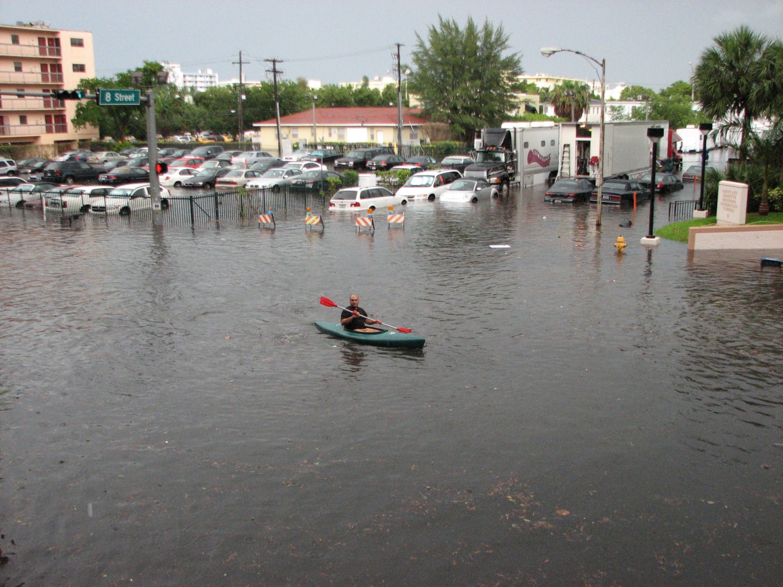 A kayak in the streets of Miami Beach, Florida in 2009 during a king tide flood that may have been exacerbated by the stormy weather. Update, apparently there were several inches of rain to exacerbate this, but it still coincides with tidal effects and the lack of drainage even before the level where the tide is over the street.