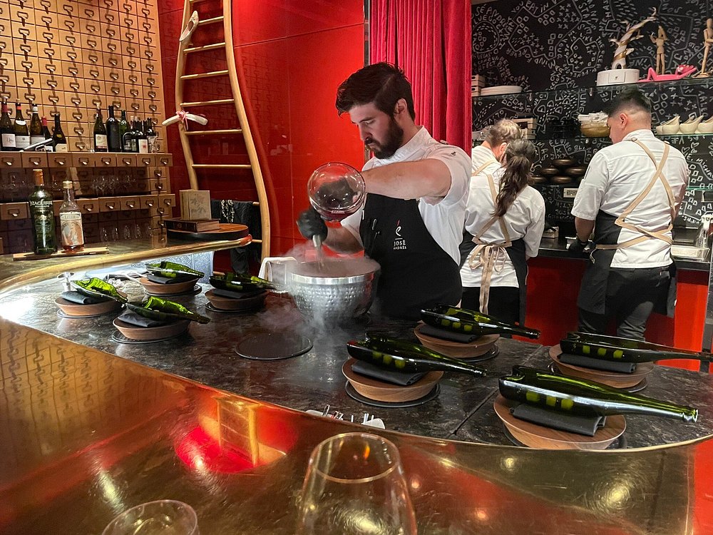 Chef at é by José Andrés creating molecular dishes in an exclusive Las Vegas dining experience known for its impossible-to-get reservations.